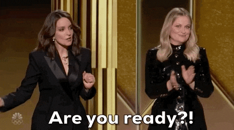 Two women clapping and feeling excitement and readiness to embrace their feminine energy