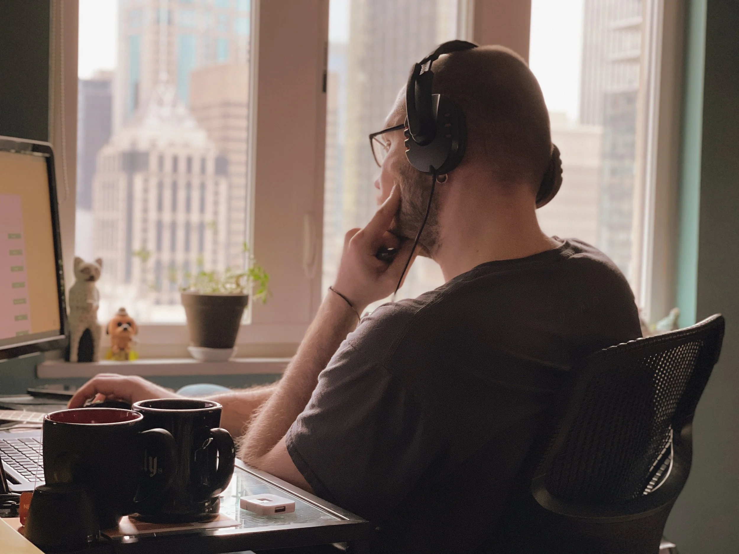 man at desk with tea representing high-functioning anxiety therapy New York City and Westchester