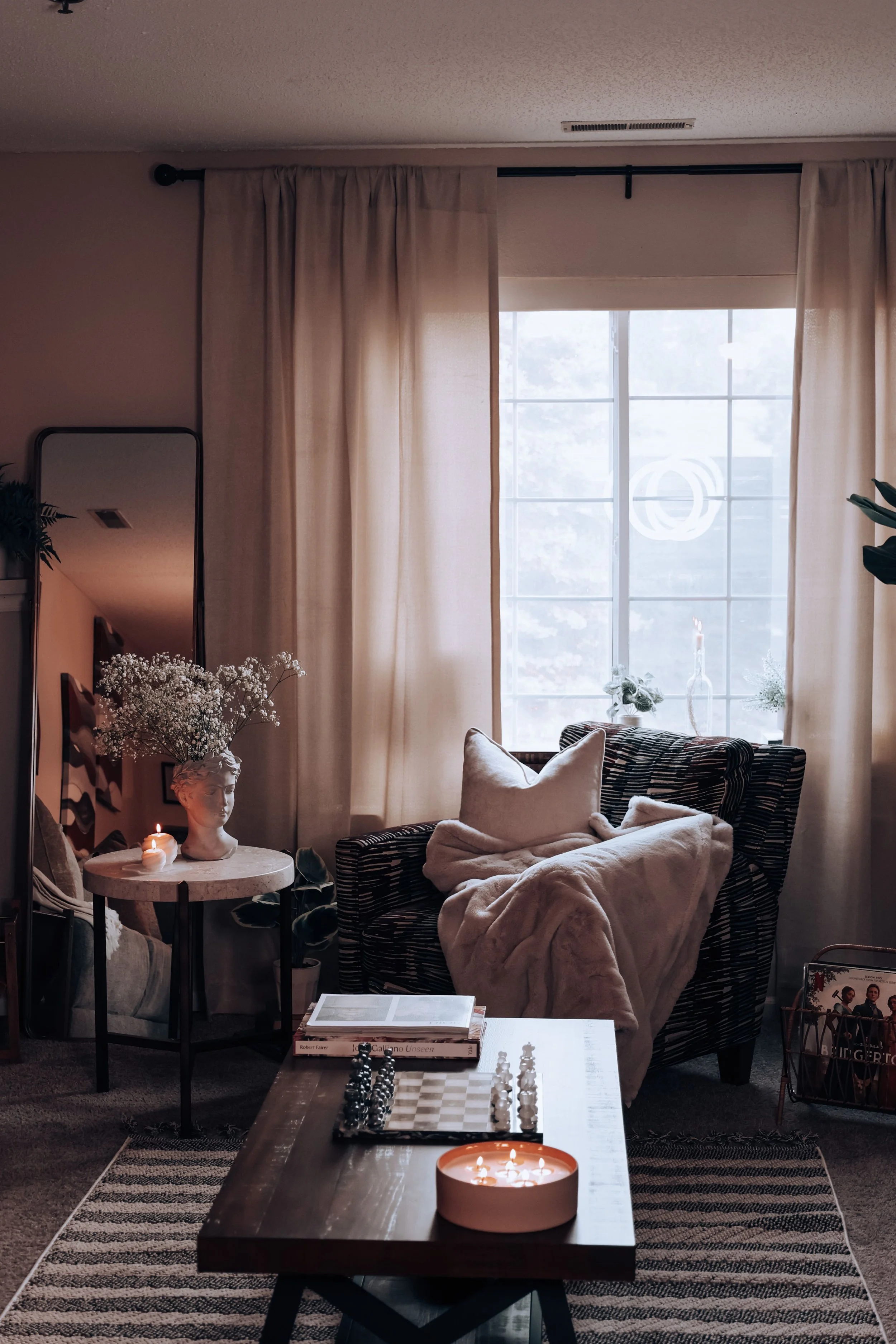 Calming space with chair in front of window representing virtual anxiety therapy New York and Westchester
