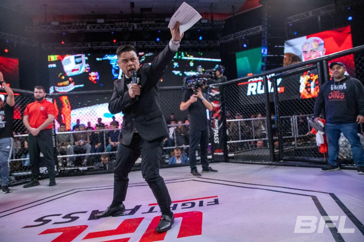 Ryan Ventura, professional MMA ring announcer, announcing fighters inside the cage at Battlefield Fight League on UFC Fight Pass