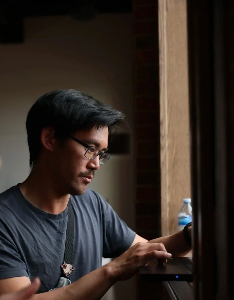 there are no squirrels in lethbridge. a behind the scenes image from the indie film. directed by conner christmas, starring nick bohle - co written by conner christmas and nick bohle. pictured is assistant director Bao Hong. photo by Annie Stehr