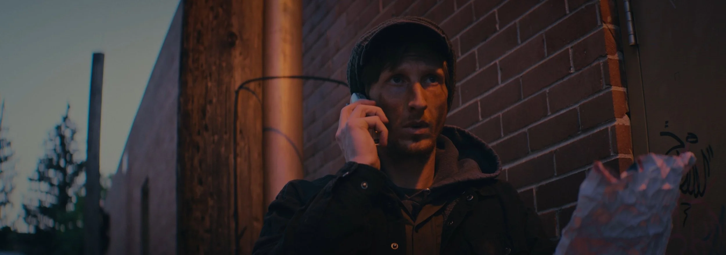 there are no squirrels in lethbridge. a still image from the indie film production. directed by conner christmas, starring nick bohle - co written by conner christmas and nick bohle. pictured is actor Conner Christmas