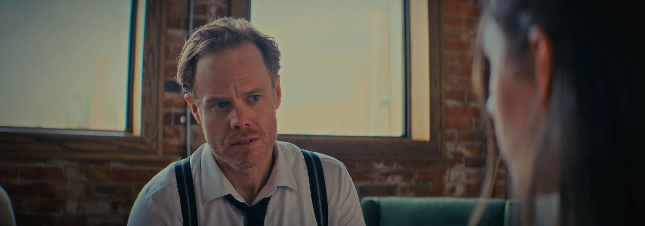 there are no squirrels in lethbridge. a still image from the indie film production. directed by conner christmas, starring nick bohle - co written by conner christmas and nick bohle. pictured are actors Nick Bohle and Irene Poole