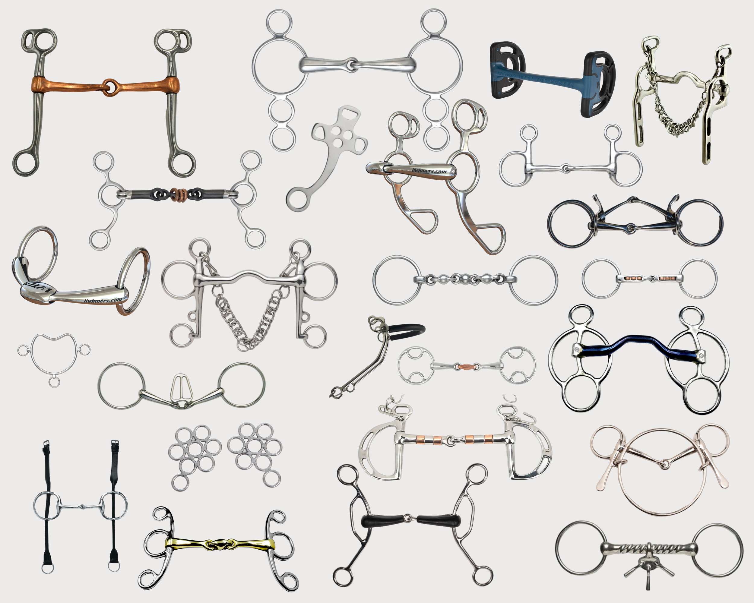 A collection of metal horse bits and bridles in various shapes and sizes.