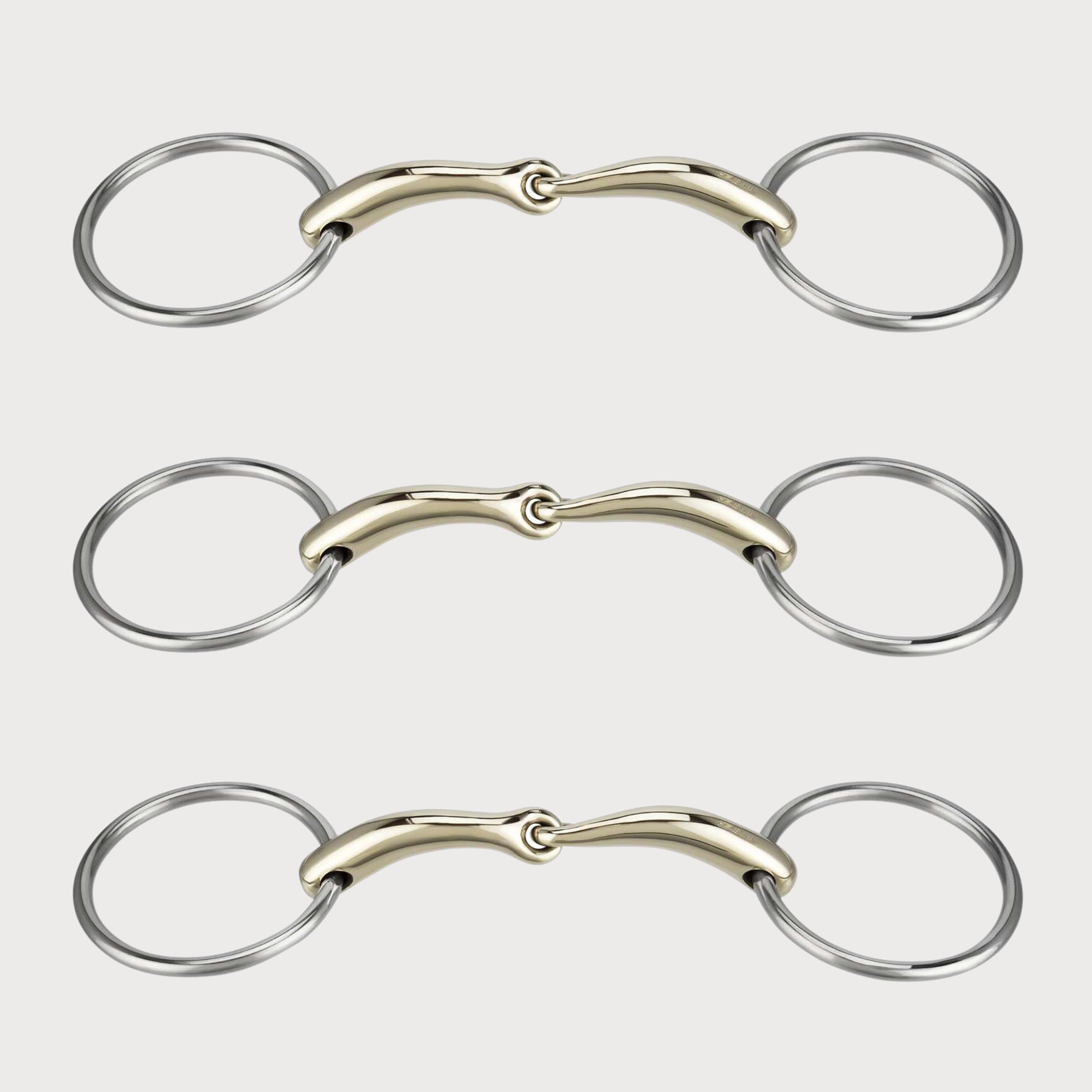 Three sets of horse bits with metal rings and mouthpieces on a plain background.