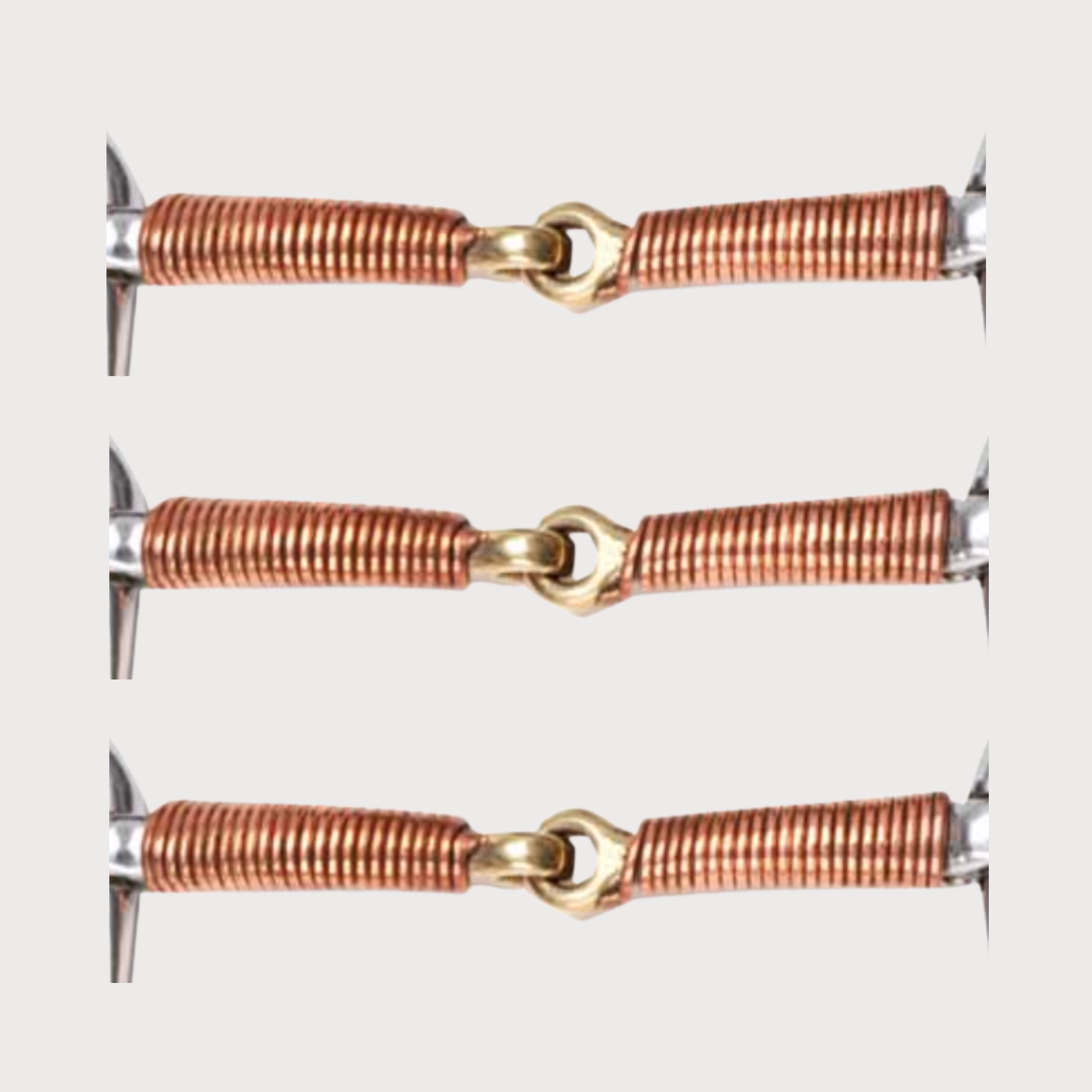 Close-up of three copper-colored wire spirals connected by gold-colored links on a white background.