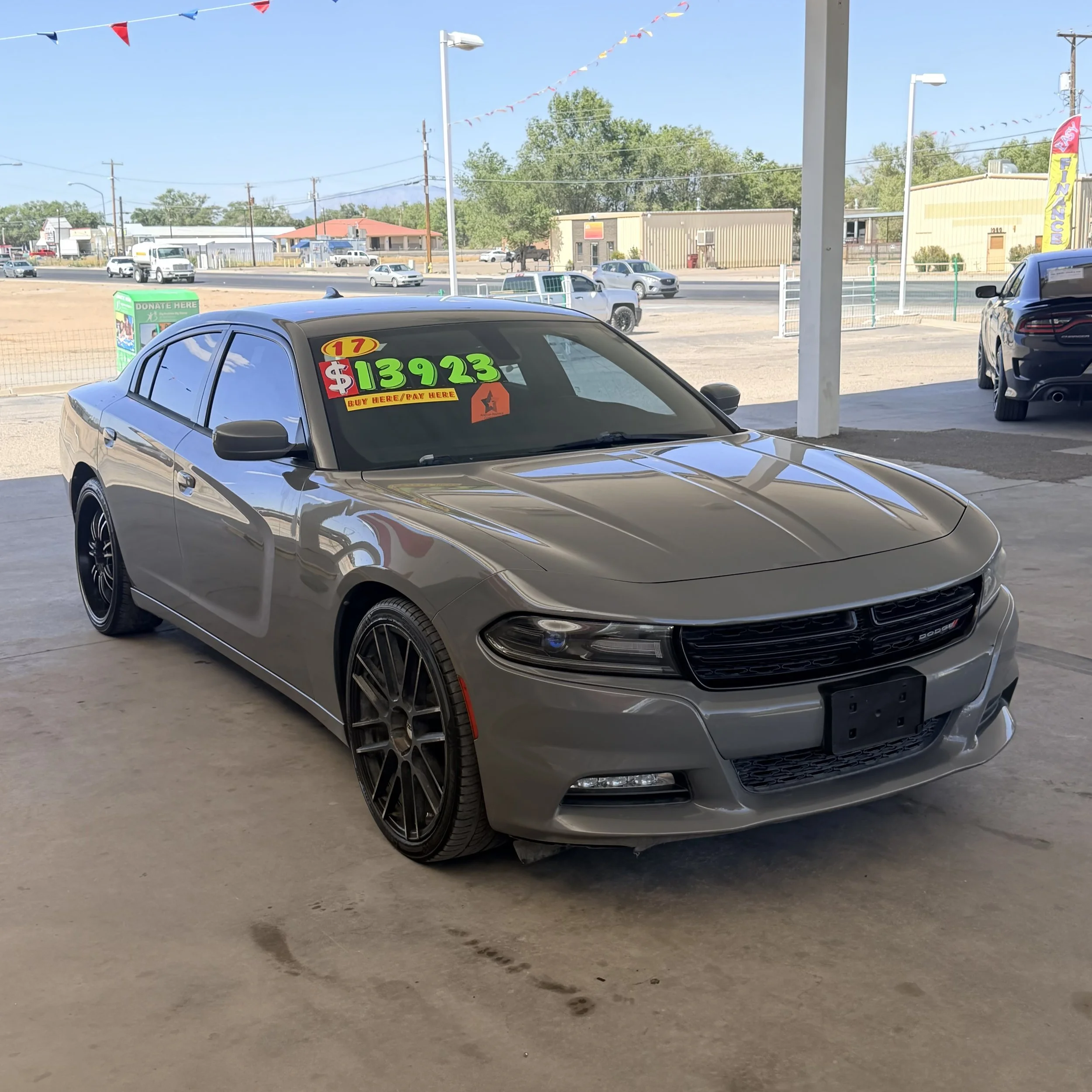 2017 Dodge Charger (127,647 miles) $13,923
