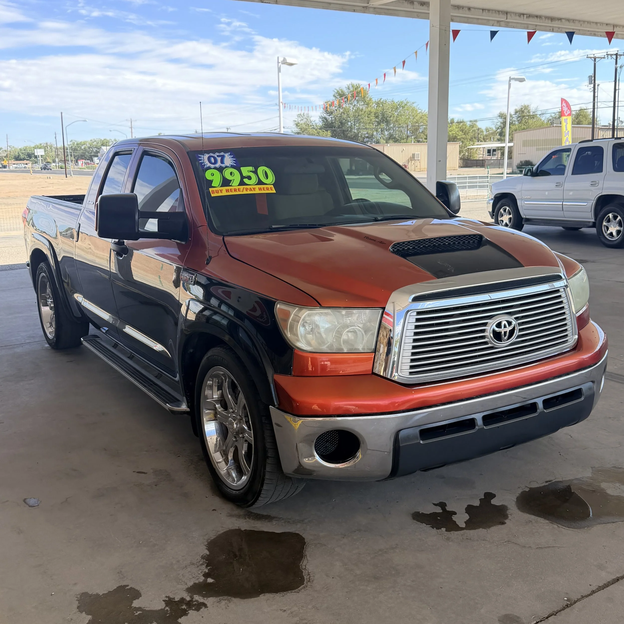 BLACK/ORANGE 2007 Toyota Tundra (192,301 miles) $9,950
