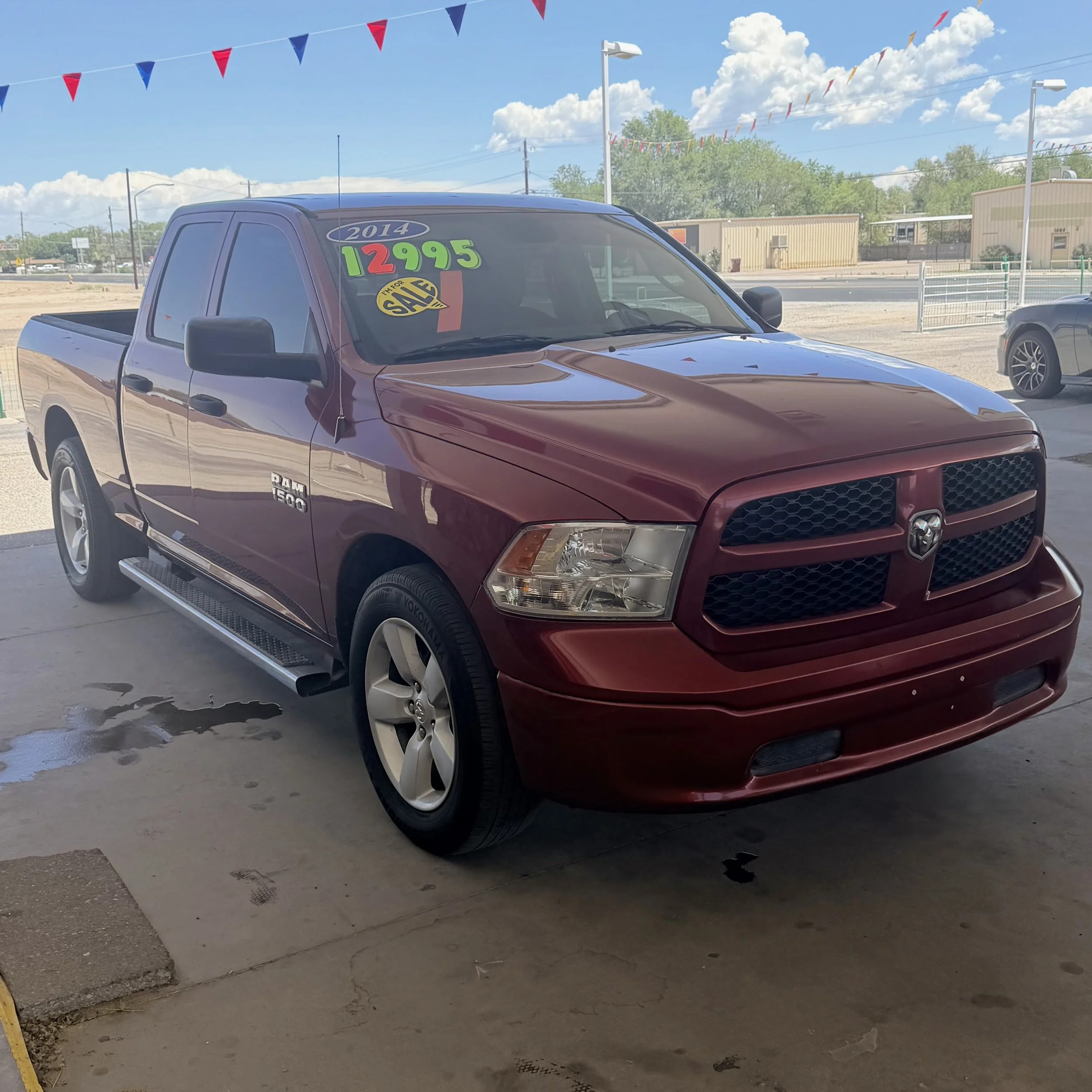 2014 Dodge Ram 1500 (163,218 miles) $12,995