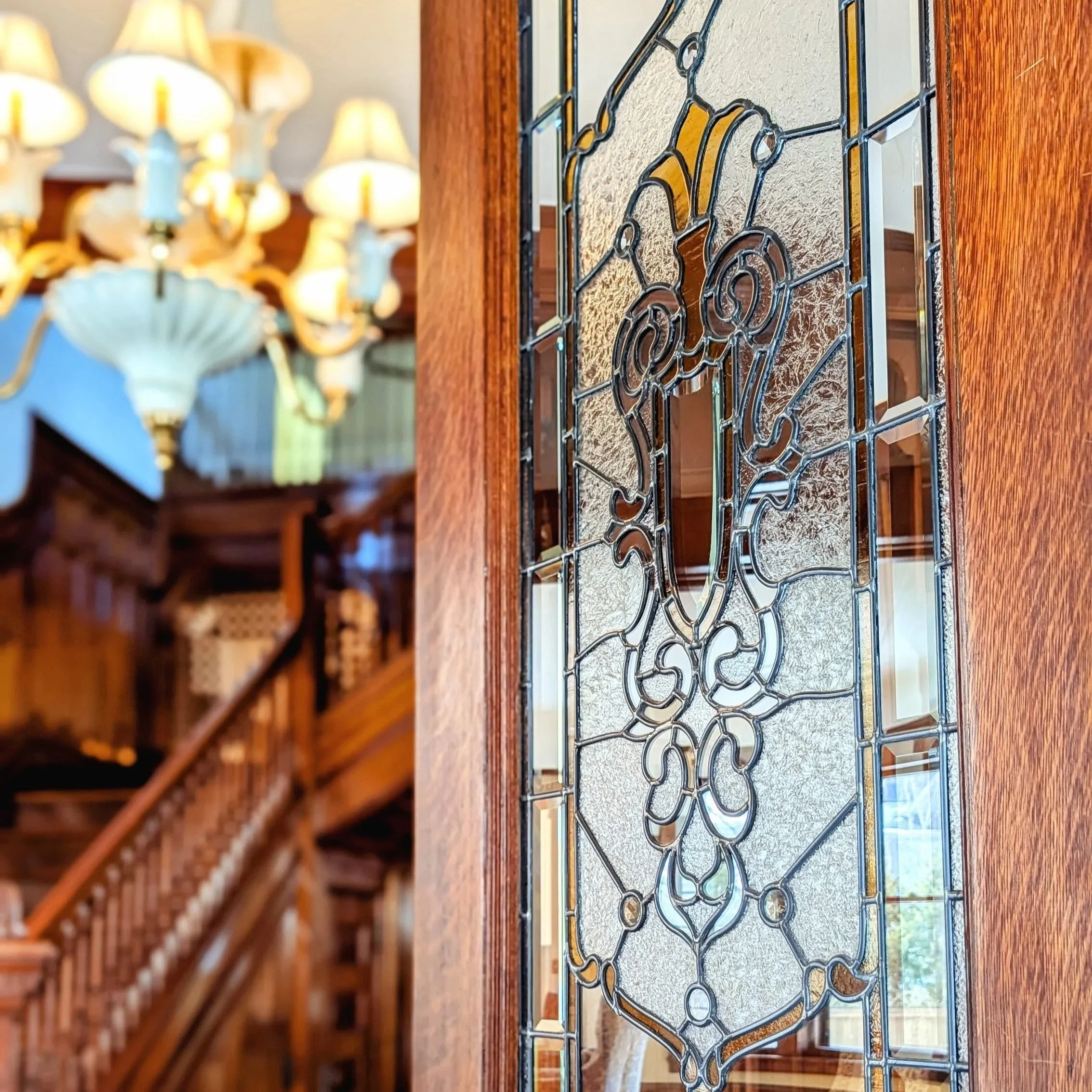 Moore House beautiful leaded stain glass window in front entrance door 