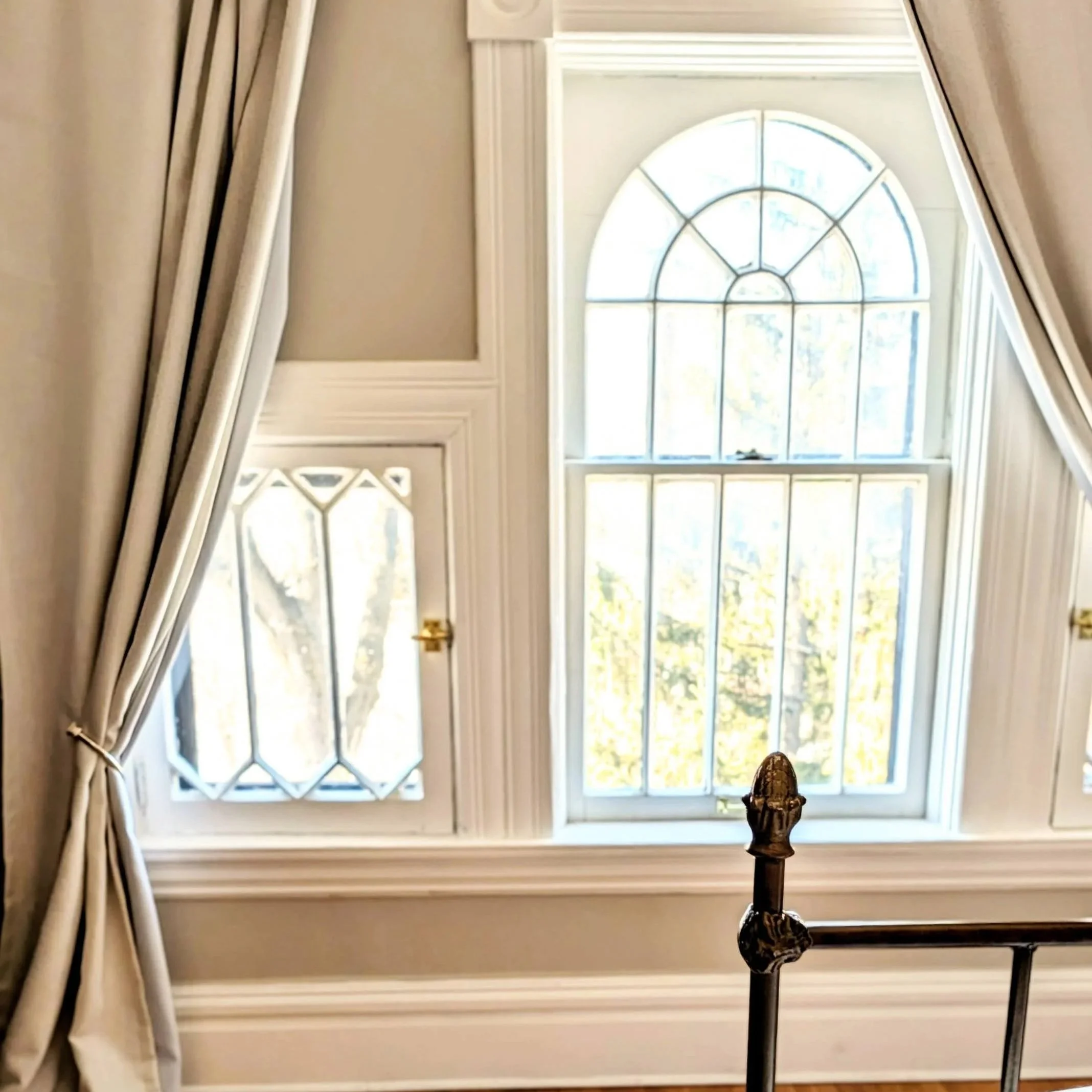Moore House upper bedroom with iconic windows and beautiful view