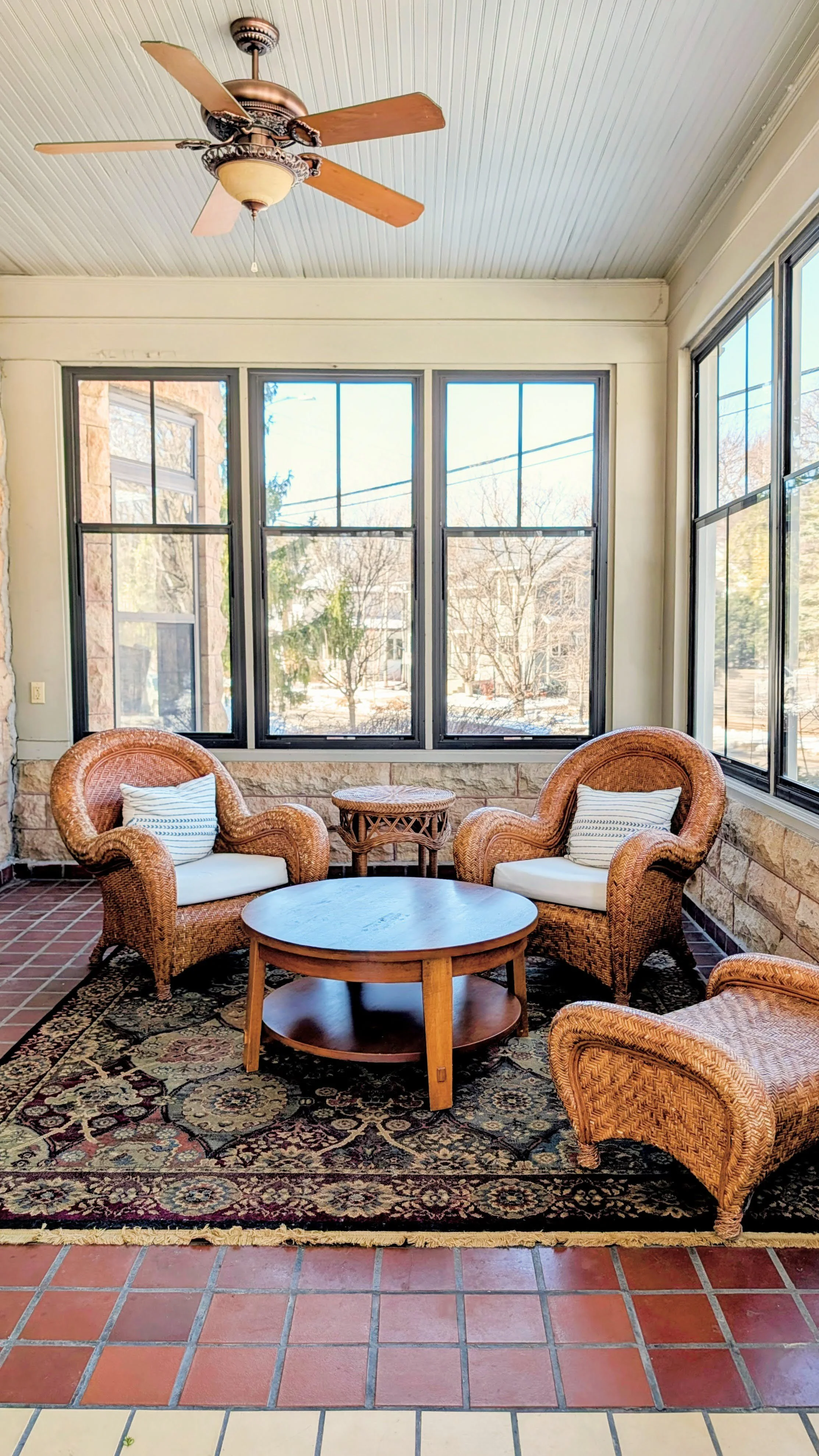 Cozy front porch seating at the Moore House