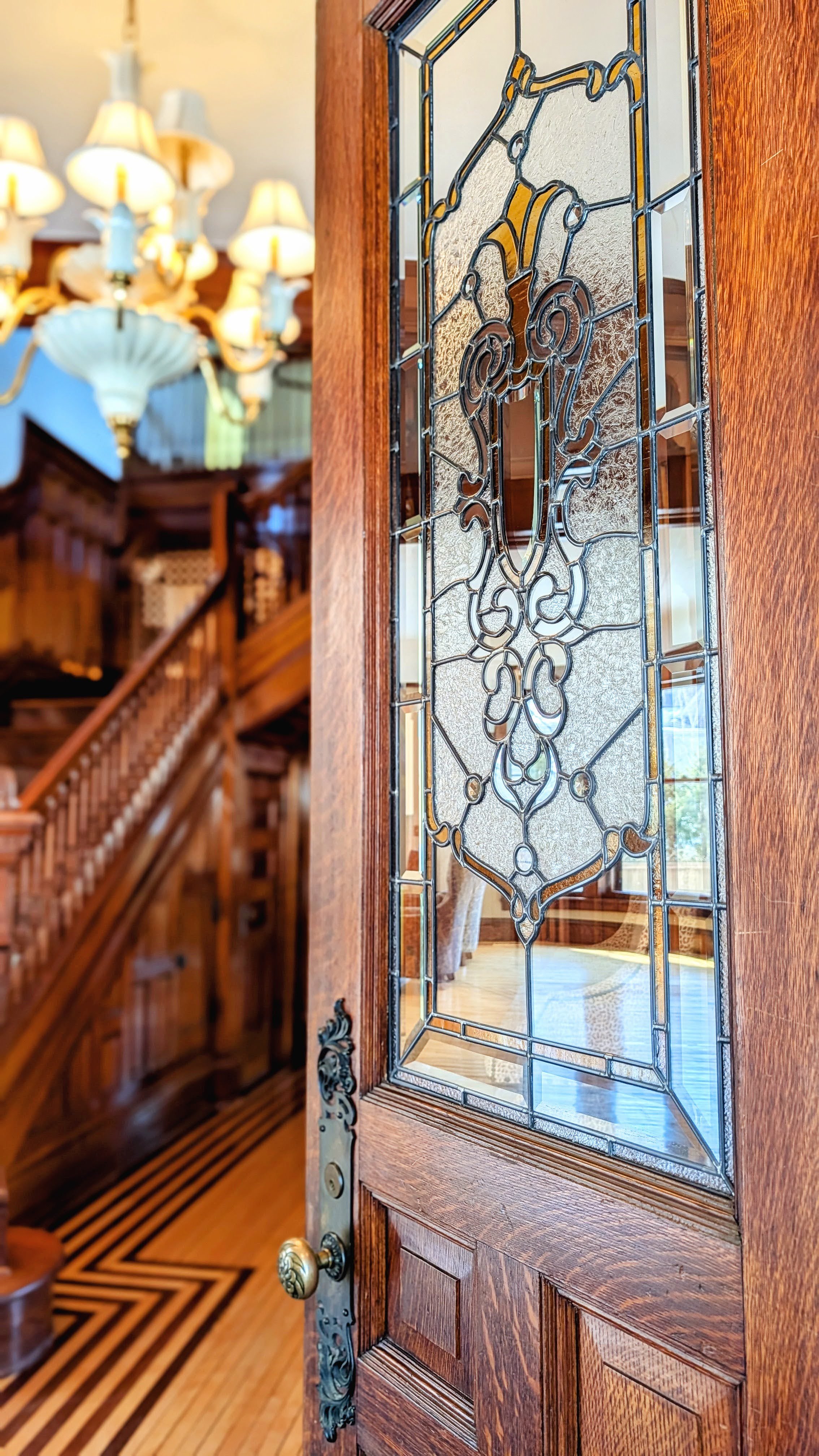 Historic stained glass window in the front door entryway