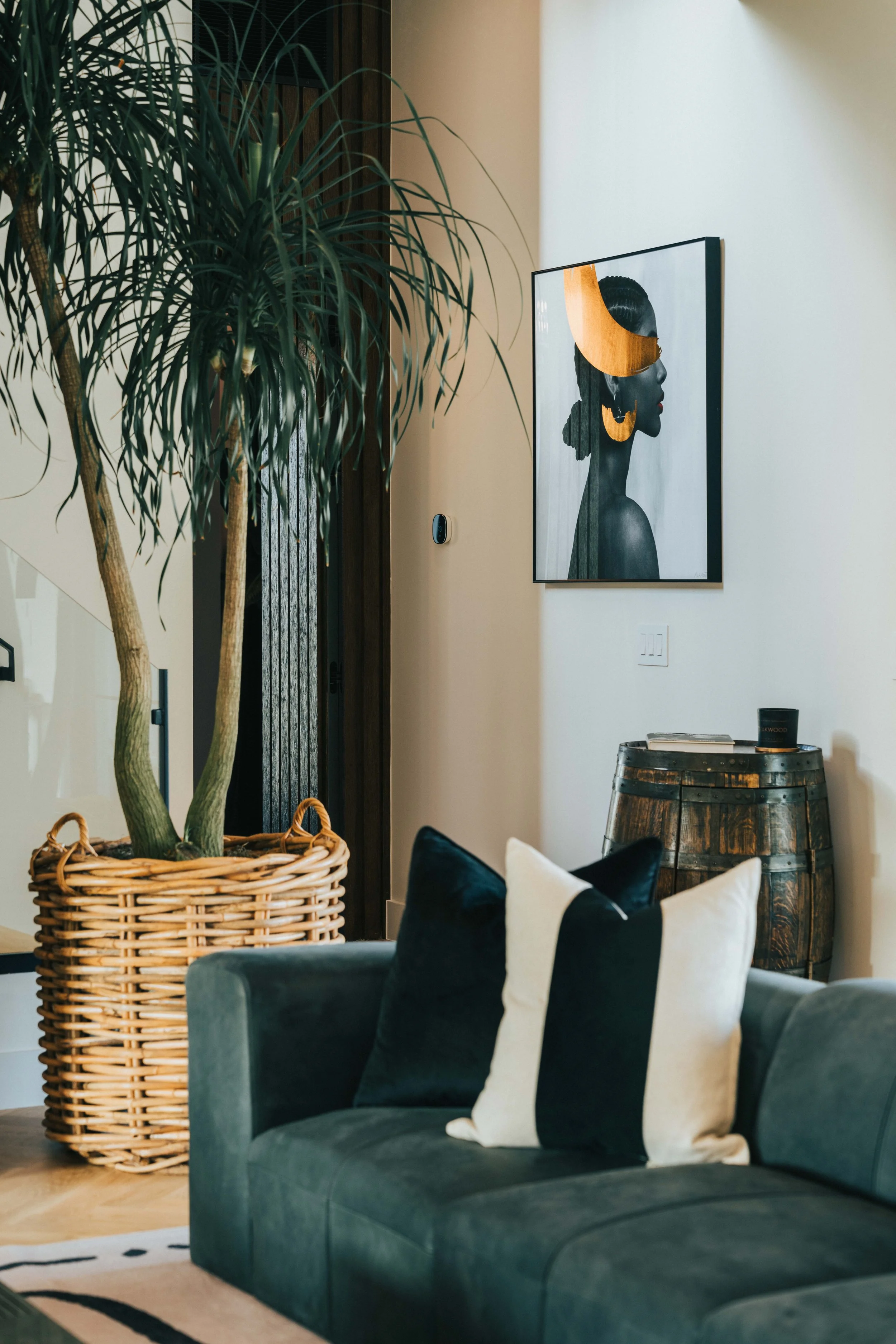 High-end mountain modern living space with custom furnishings, statement art, natural materials, and warm, refined detailing.