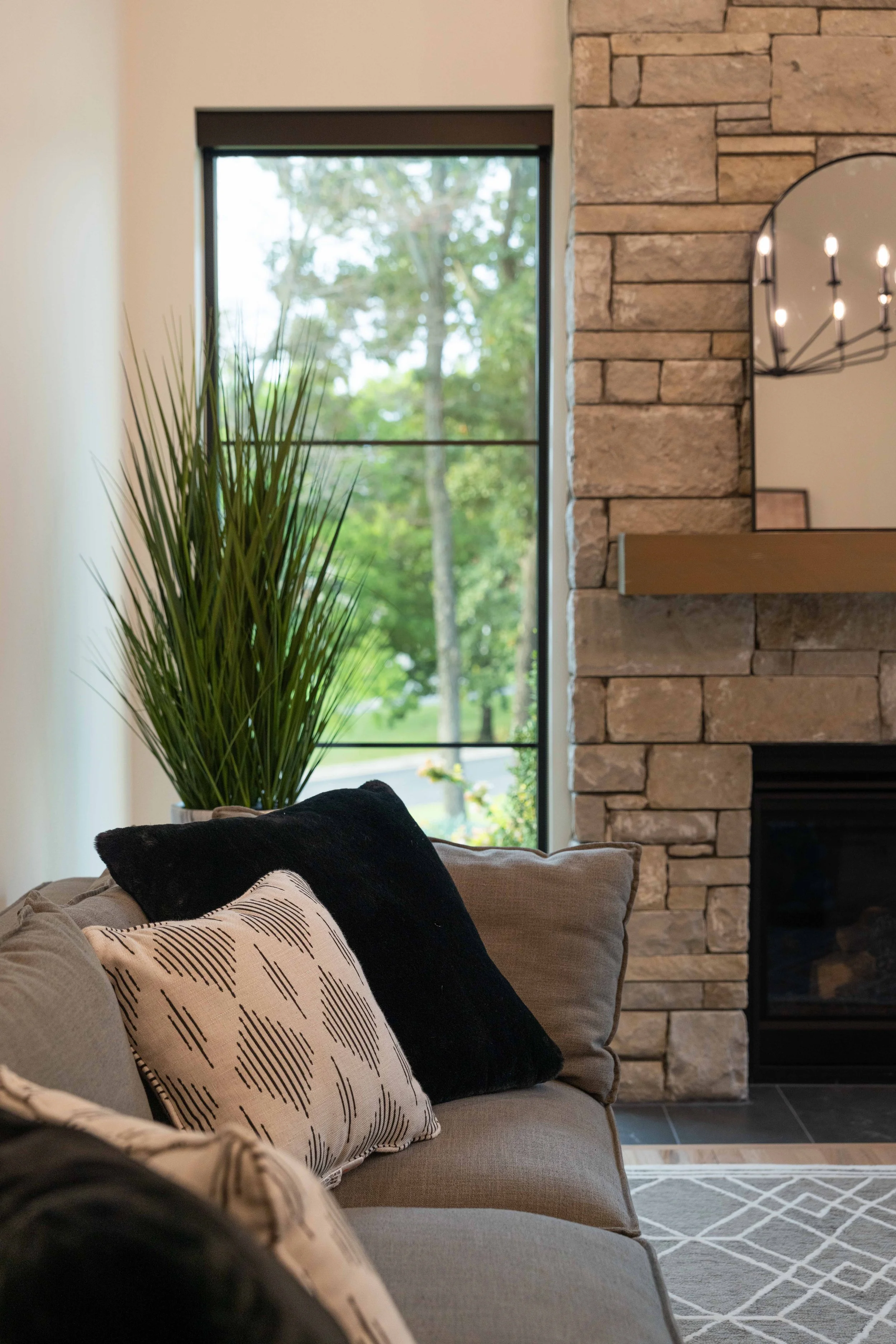 Custom-designed lounge chair with textured upholstery and refined styling in a luxury interior.