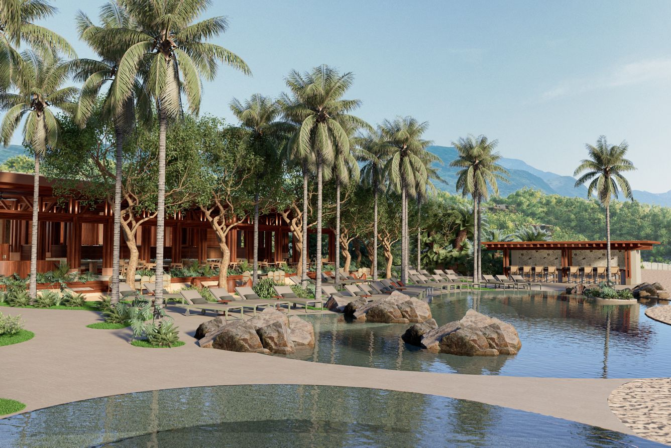 A tropical resort pool area with palm trees, lounge chairs, and a wooden pavilion in the background against a mountainous landscape.