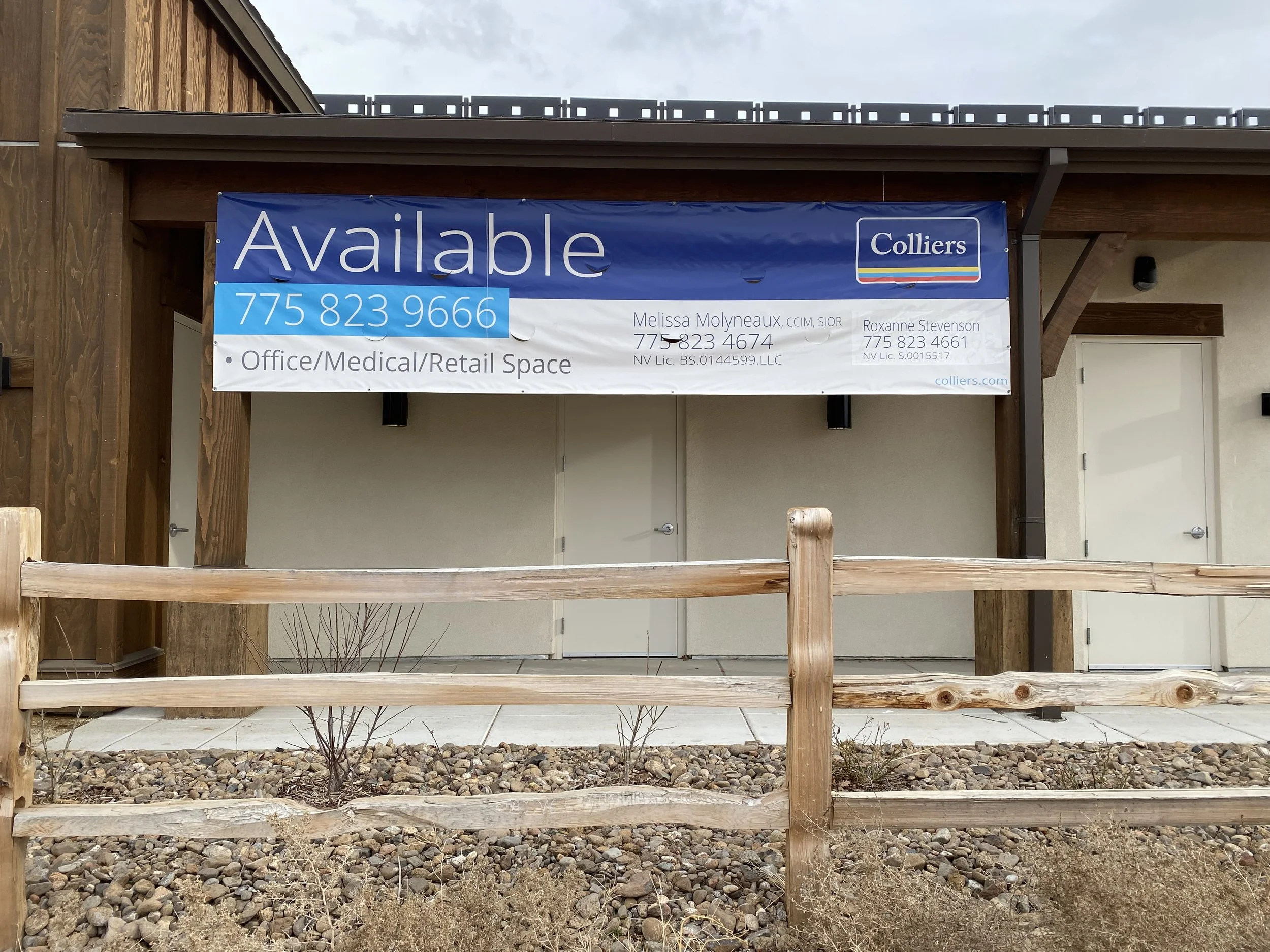 A storefront with a blue and white sign that says 'Available' and provides a phone number for leasing office/medical/retail space, with contact details for Melissa Molyneaux and Roxanne Stevenson.