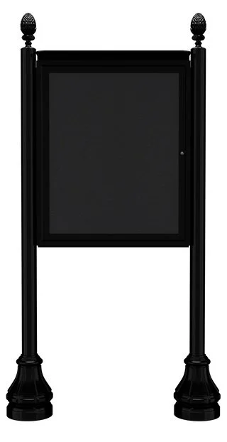 A black outdoor stand with a chalkboard or bulletin board between two decorative poles.