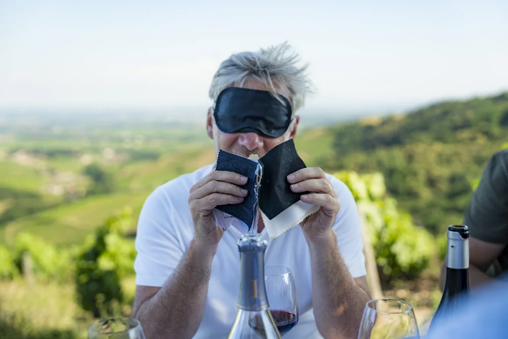 Winemaker pouring a tasting