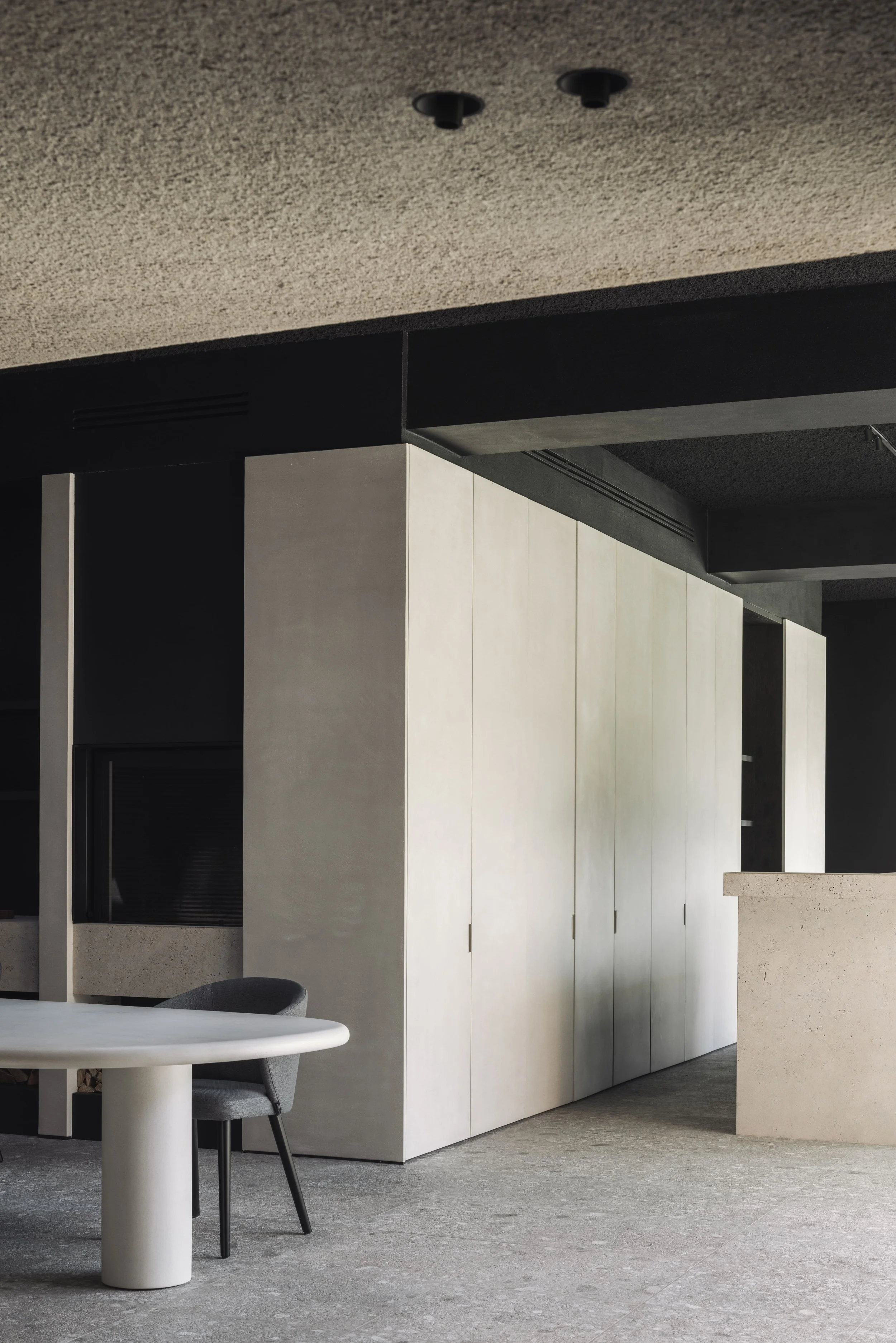 Bureau Destadsbader interior architecture high-end poolhouse design, interior shot bar, dining area, cabinetry, fireplace