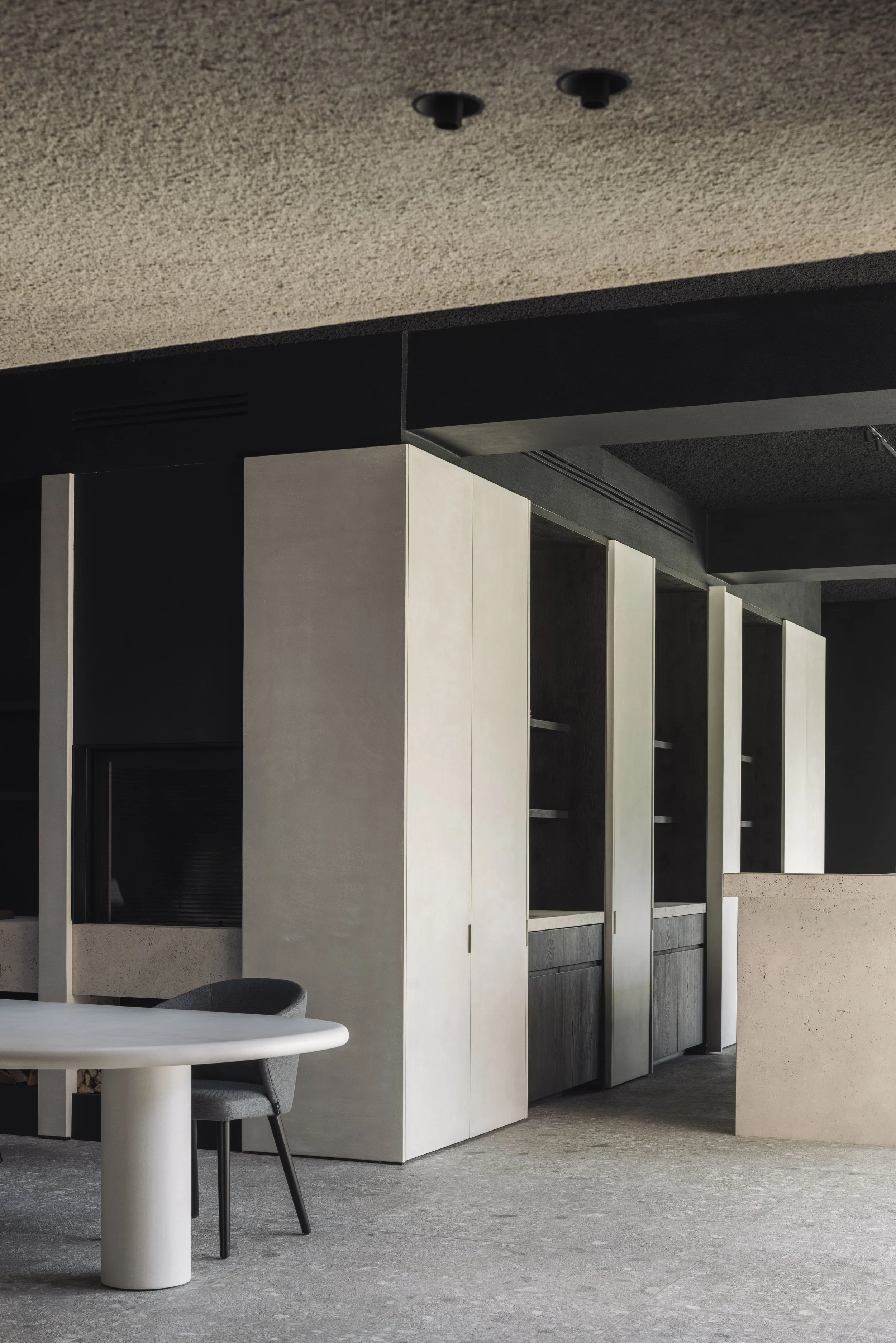 Bureau Destadsbader interior architecture high-end poolhouse design, interior shot bar, dining area, cabinetry, fireplace