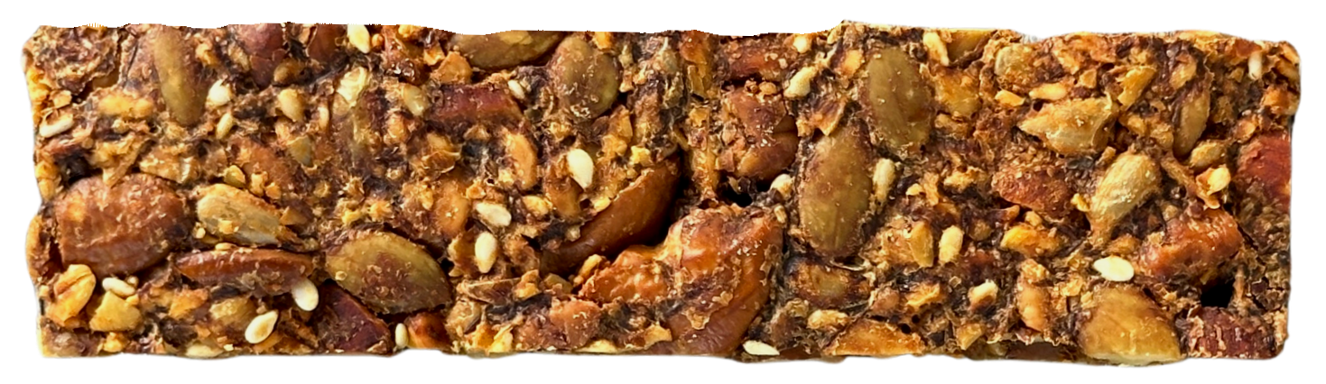 close-up of a homemade noci granola bar with nuts, oats, seeds, herbs, and spices.