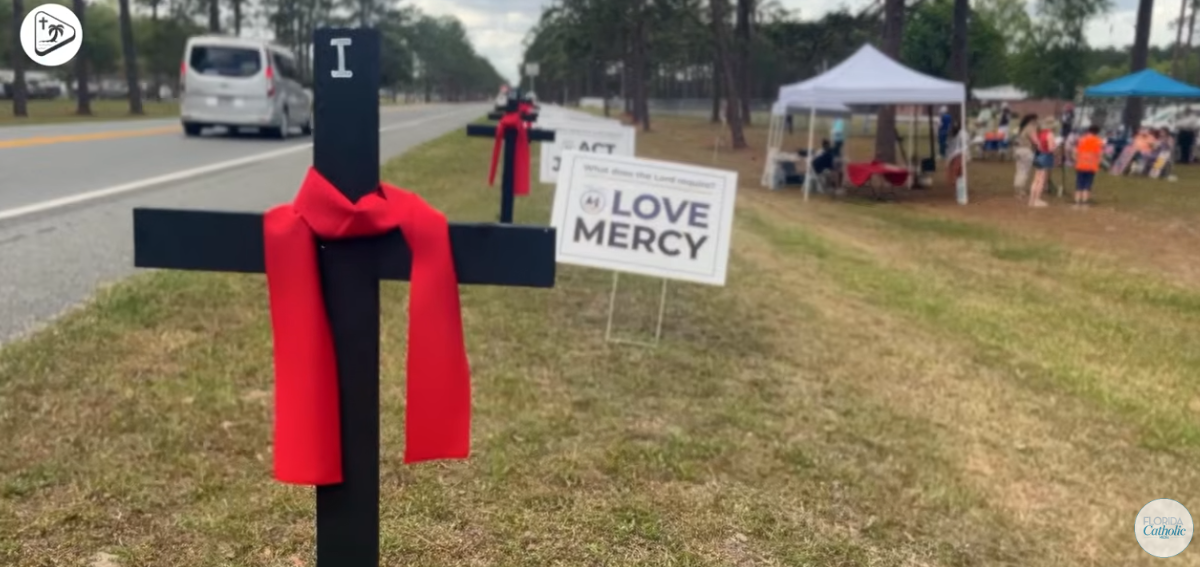 Faithful Catholics Walked, Prayed, and Sang Outside a Florida Detention Facility