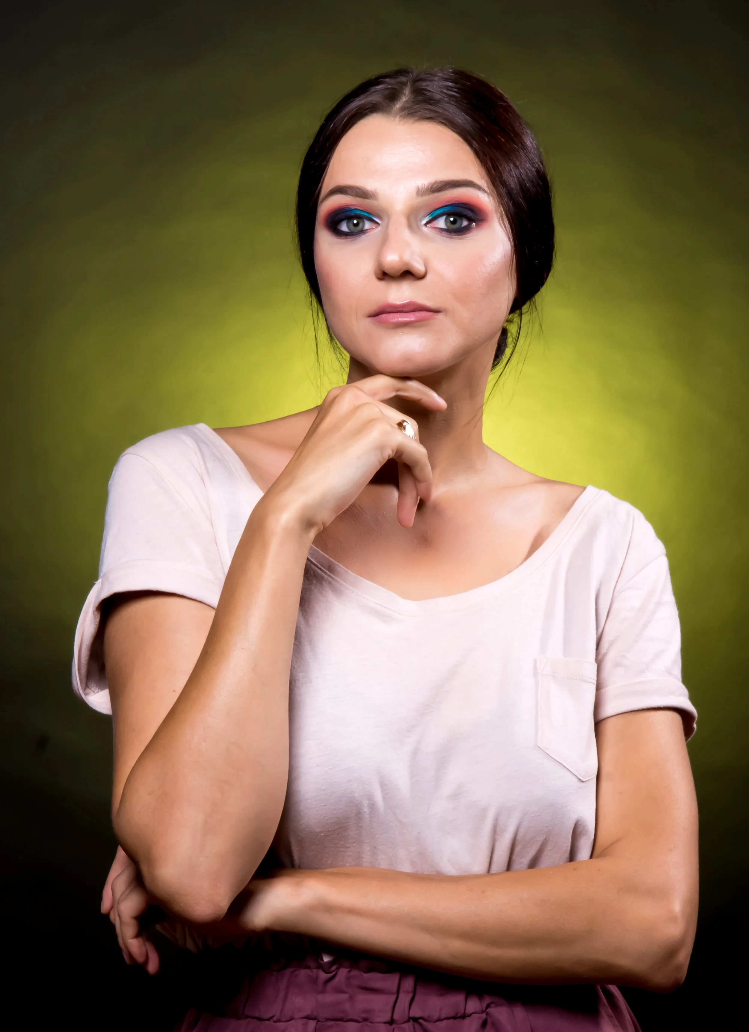 Dynamic actor headshot showing character range, shot in-studio with professional direction.