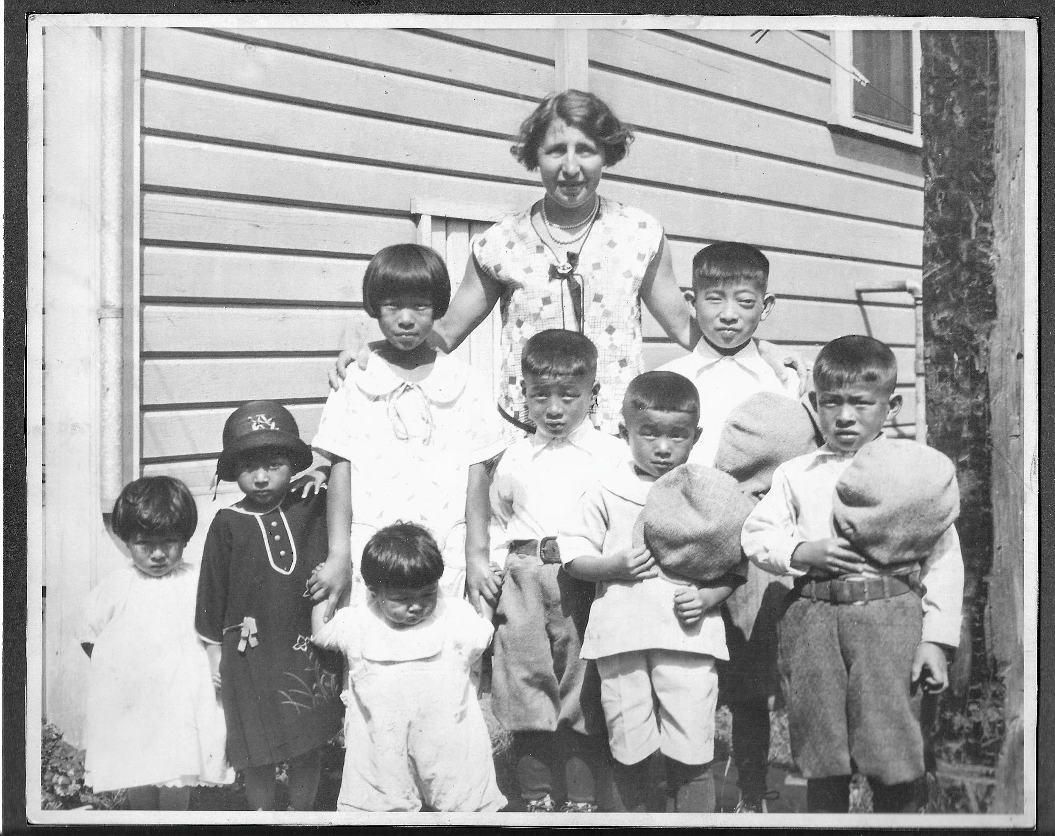 The Noritake children, l-r Yasuko (Donna/Yako), Mieko (Mickey), Tatsumi (Patricia/Pat), Sakae standing above Pat, Yoshito, Suyeo, Koshiro, Tsuyoshi (Tom).
