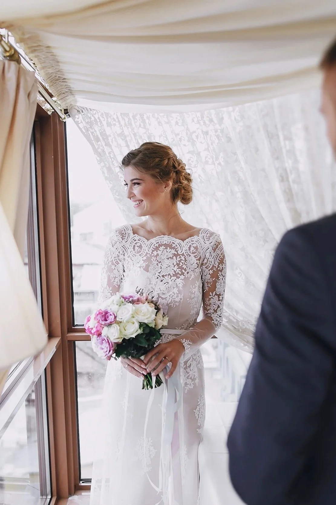 Expertly tailored to highlight the bride’s natural shape with elegance.