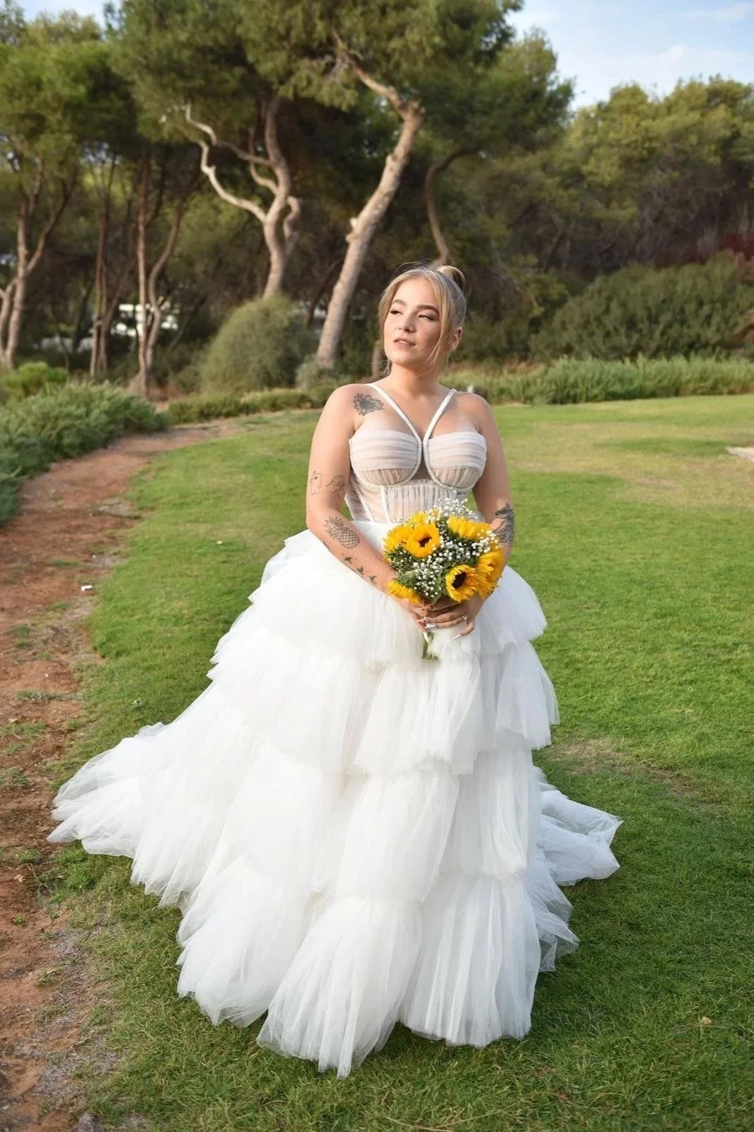 A couture gown designed to move effortlessly through every moment.