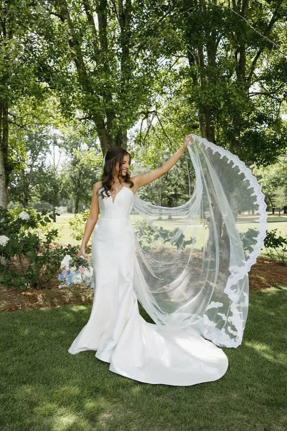 A refined bridal look shaped through expert draping and precise construction.