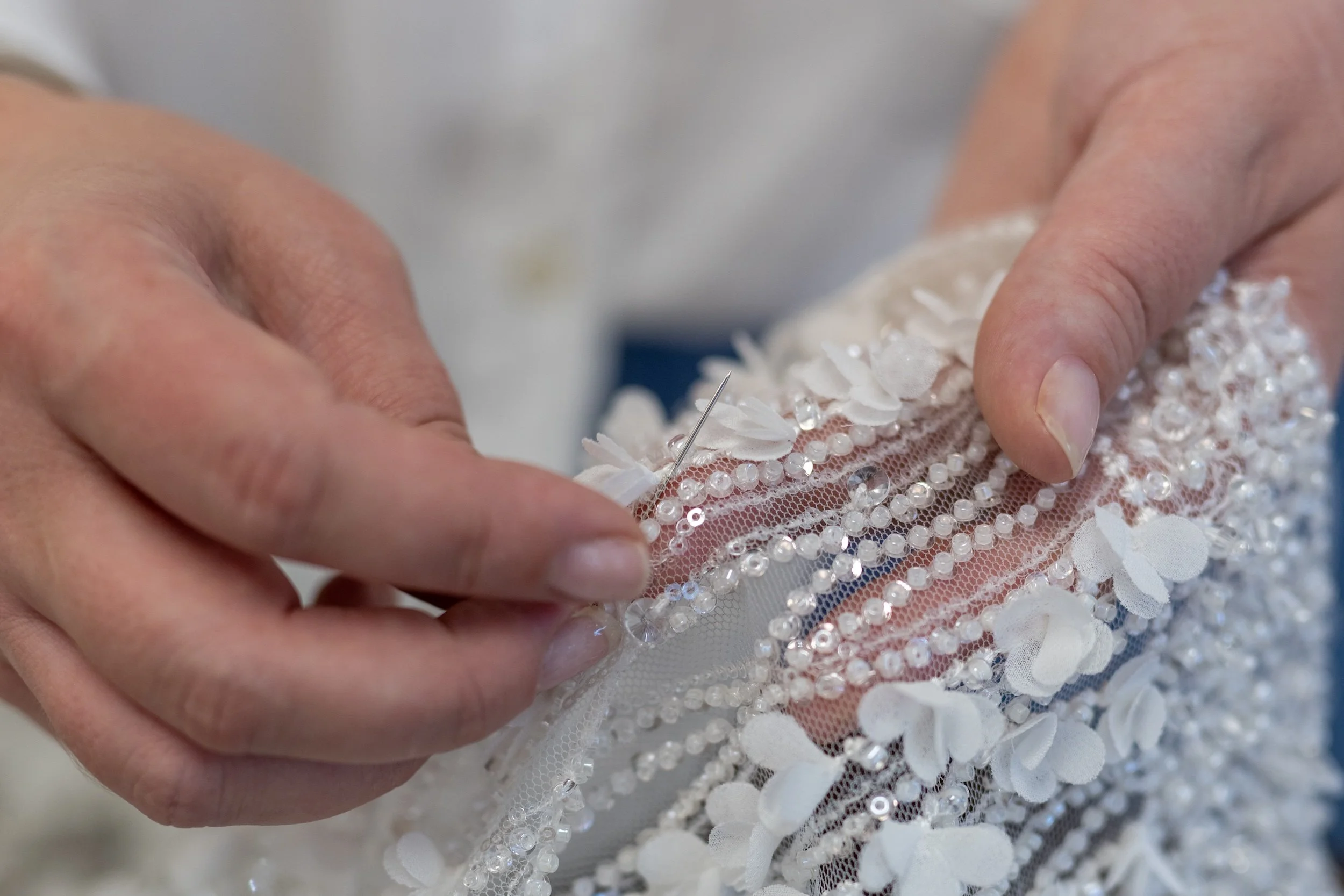 Hand embroidery details on a couture bridal gown at NiEl Bridal Atelier