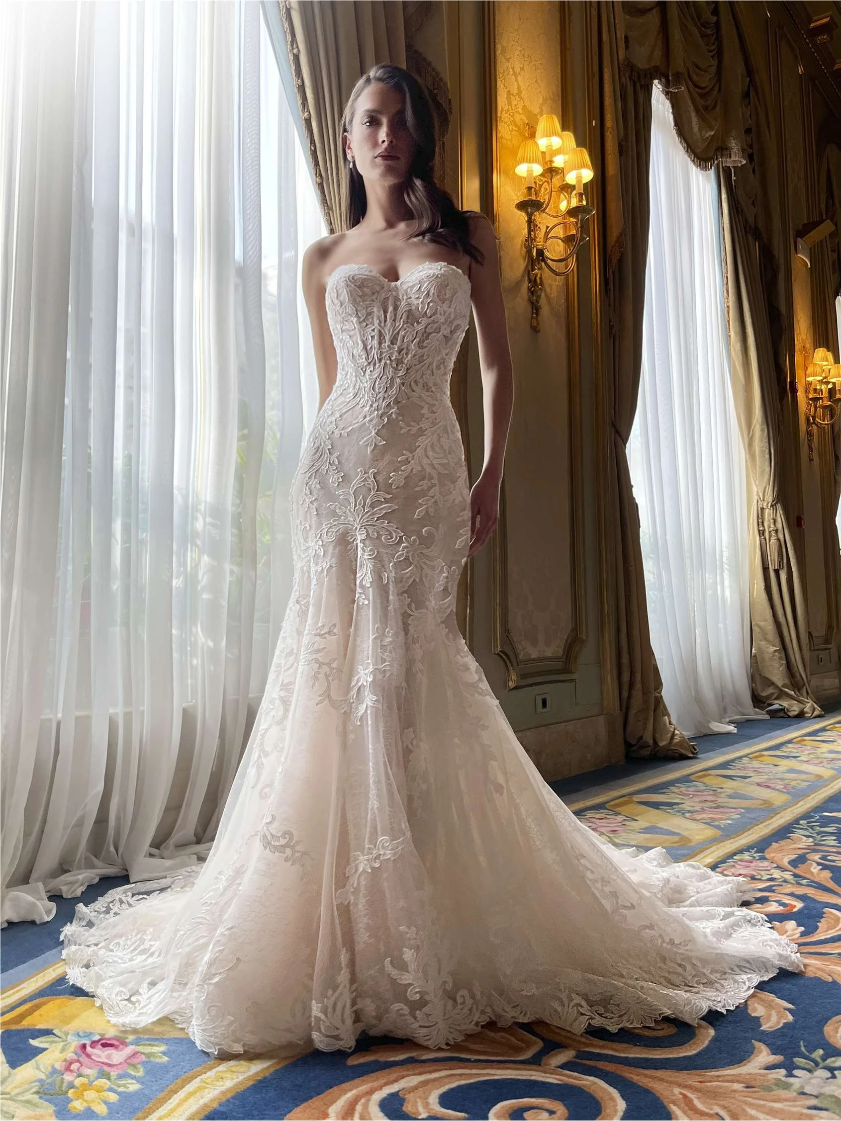 Lacey mermaid gown with a sweetheart neckline and the option for a detachable overskirt