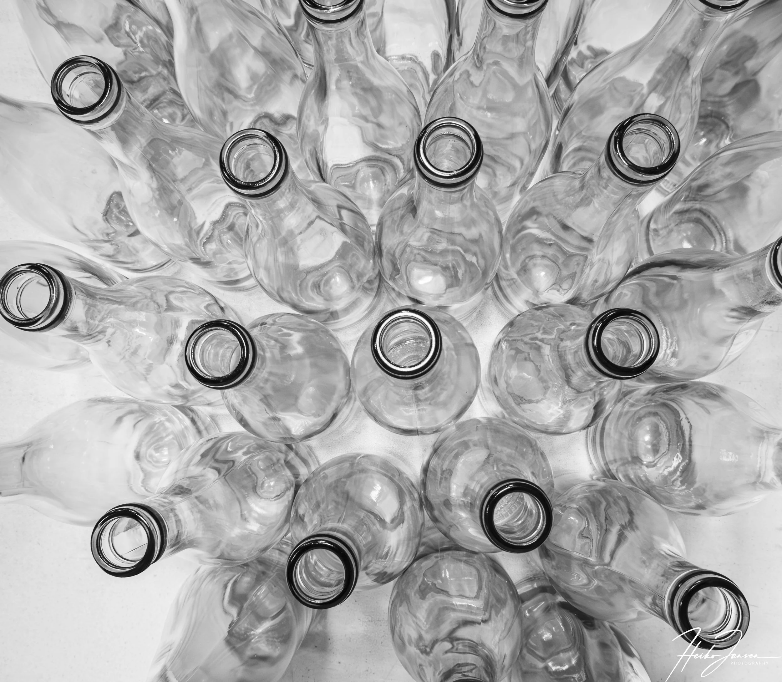 Bottles. 

Sony RX100M7 24-200, f2.8-4.5;  9mm (24mm eq), 1/30 sec, f6.3, ISO 500, 0 EV.