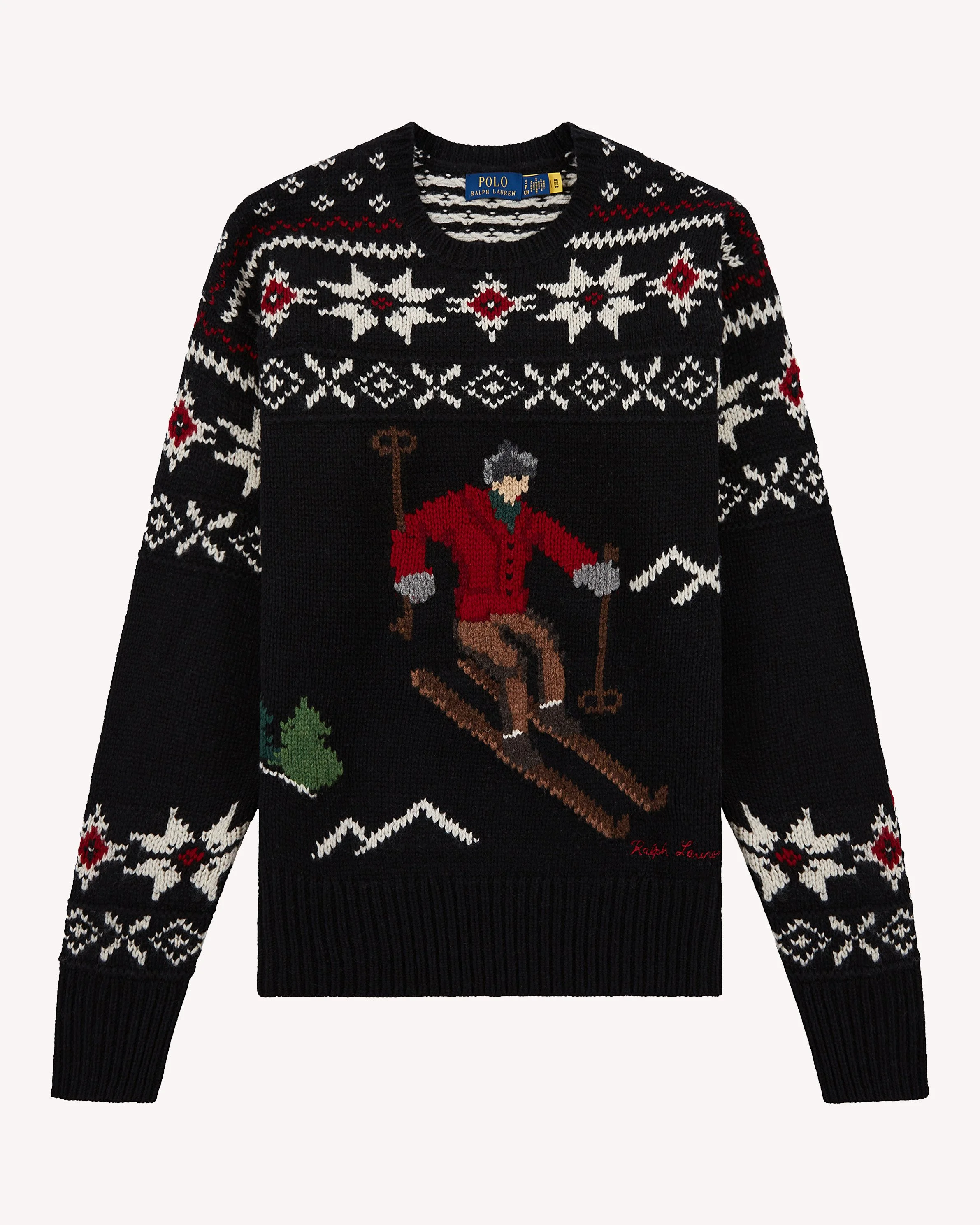 Black holiday sweater with white, red, green, and gray Christmas-themed patterns including a person on a horse and trees.
