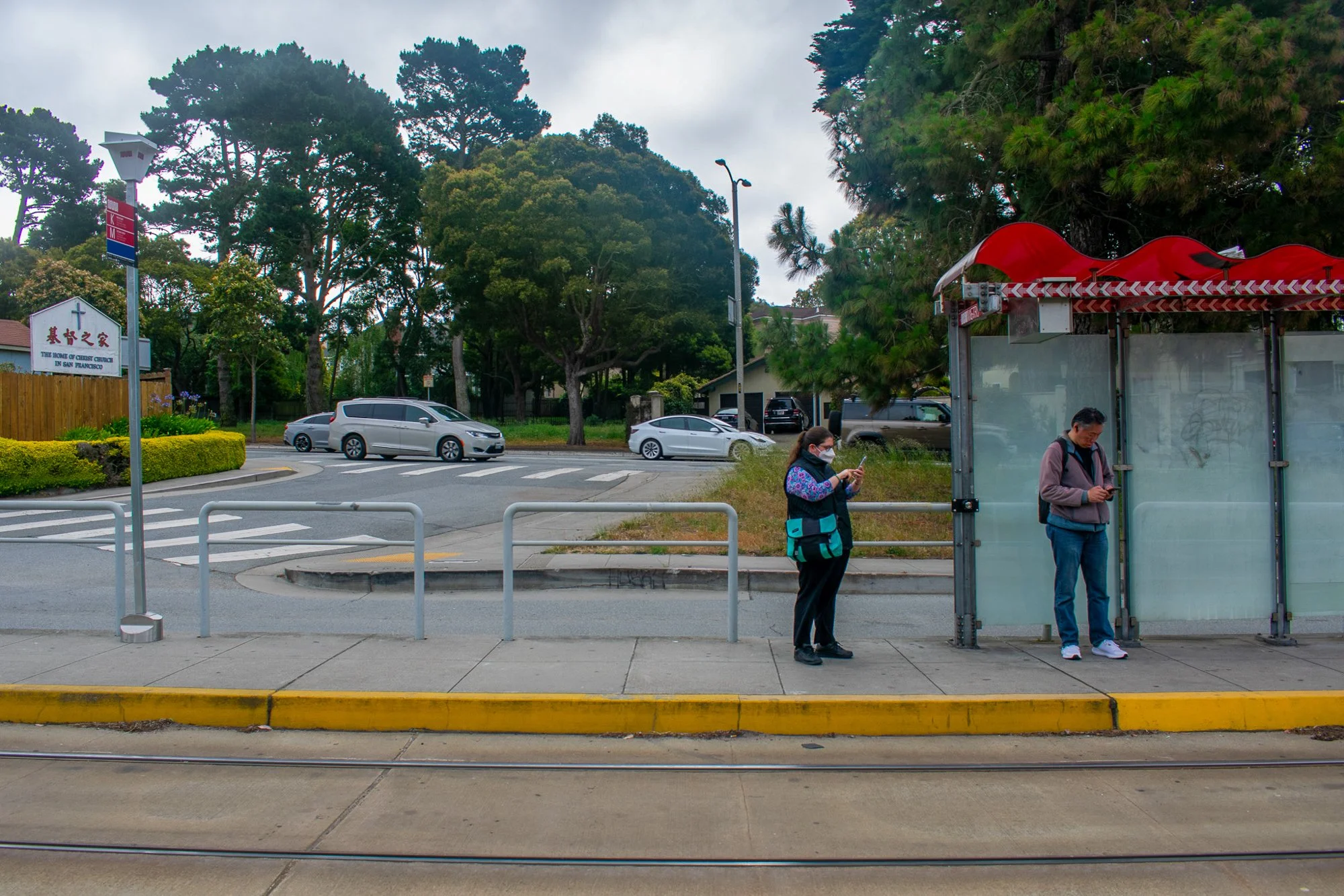 Andrea waits for the metro on Tuesday, June 3. She has worked at Terreno Realty Corporation as an office clerk for almost four years. 

She was hired through WorkLink California, an employment service that helps place people with disabilities in jobs