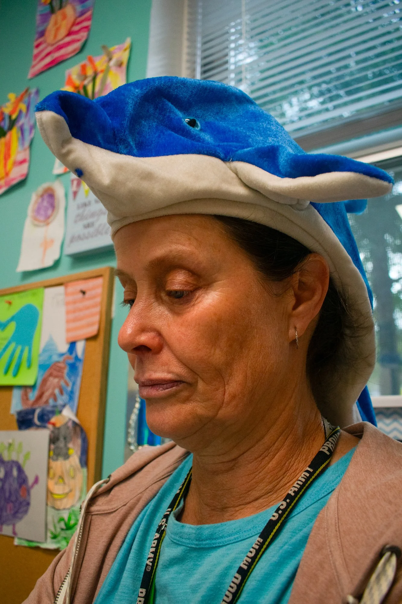 Minogue checks her emails while wearing her shark hat, regularly communicating with parents about medications, vaccines, allergies and overall student health. 
Minogue is from Stratford, Canada and earned her nursing degree from St. Francis Xavier Un