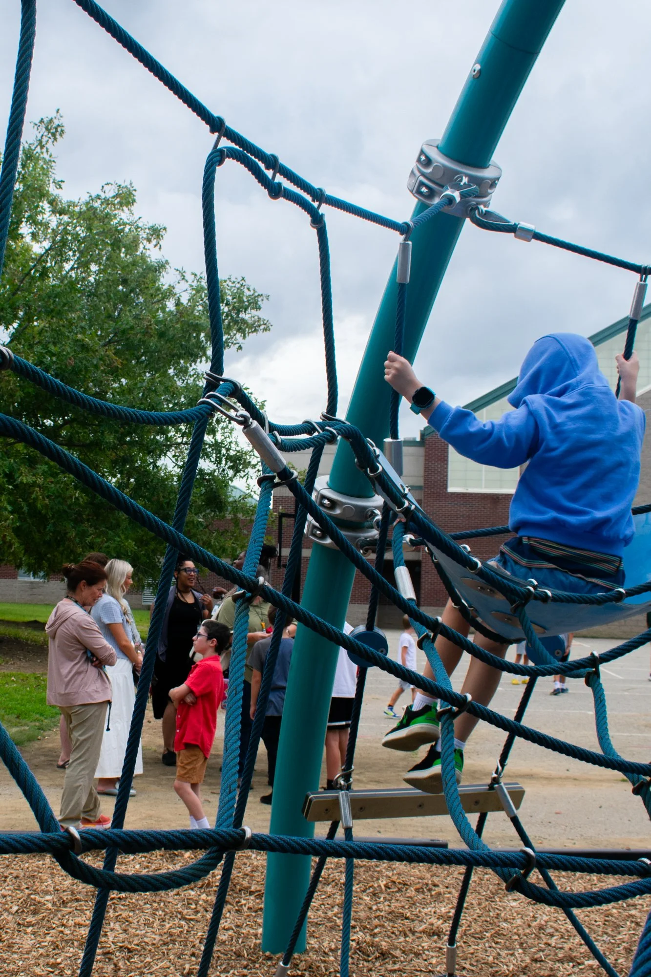 Minogue visits fifth graders during recess. She loves their energy and uniqueness and encourages them to believe they can achieve anything. Minogue said she feels like the school mom, giving students love and attention they may not get at home. “Chil