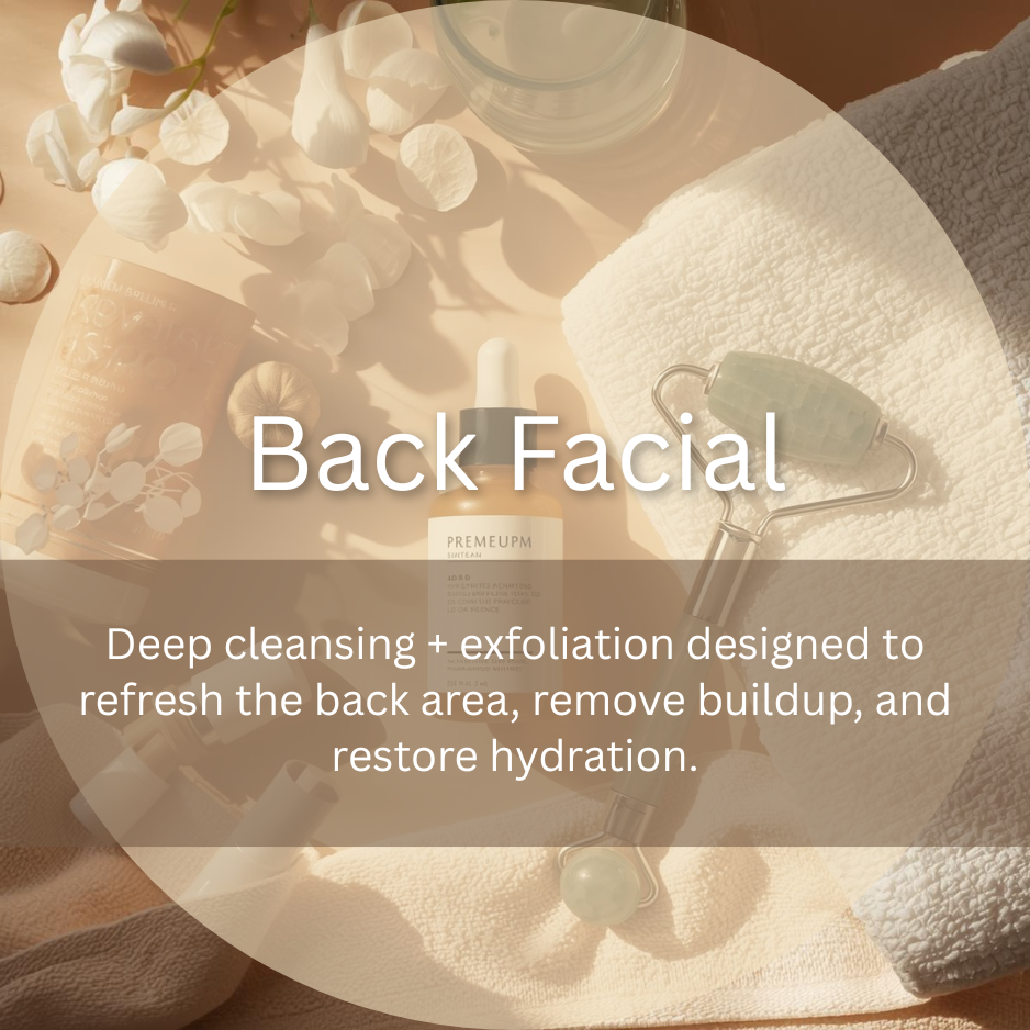 Skincare products, a jade roller, a white towel, cotton flowers, and a glass of water on a light-colored surface, arranged for a skincare routine.