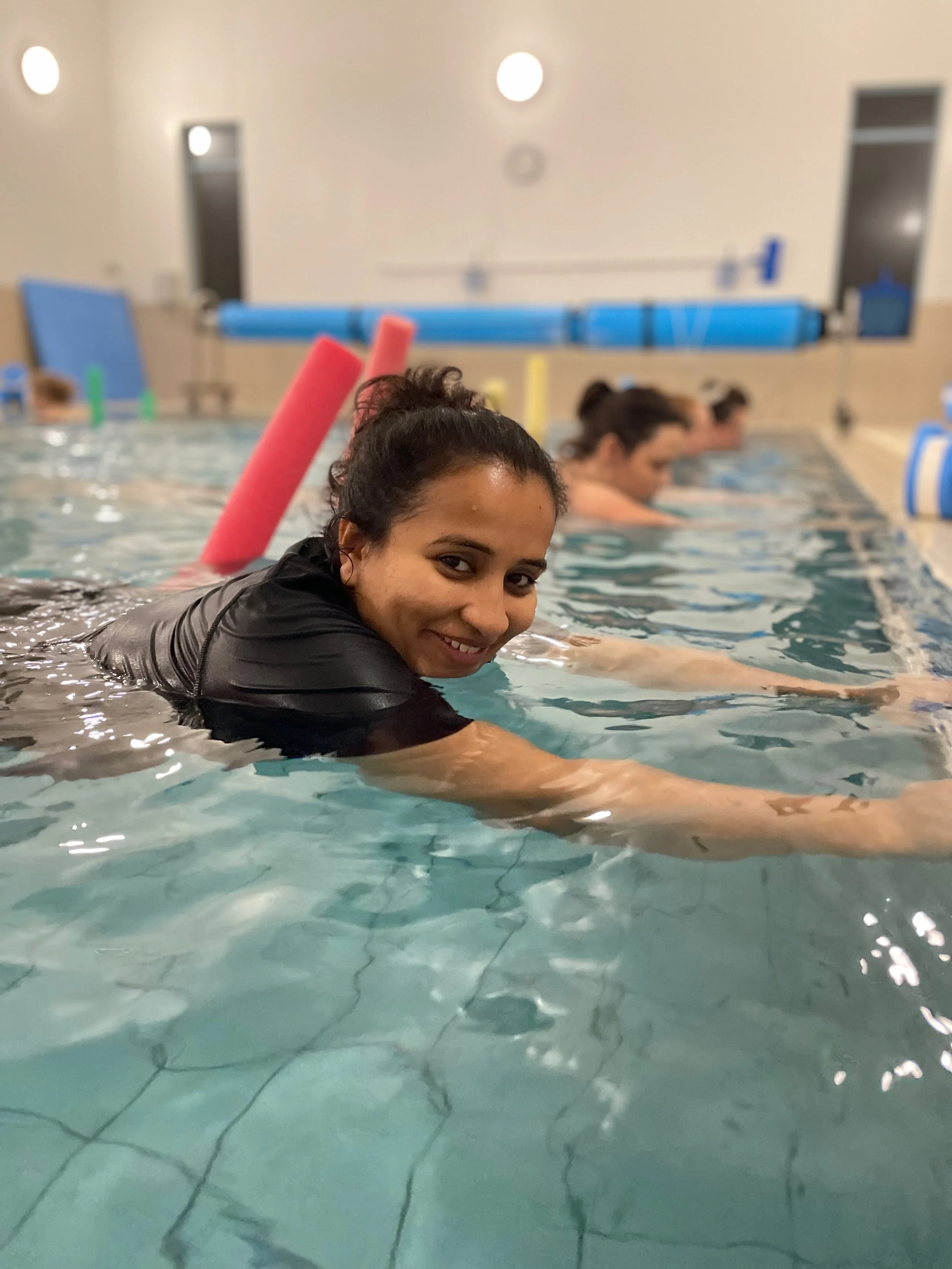 Pregnant woman enjoying prenatal physio aquatic classes