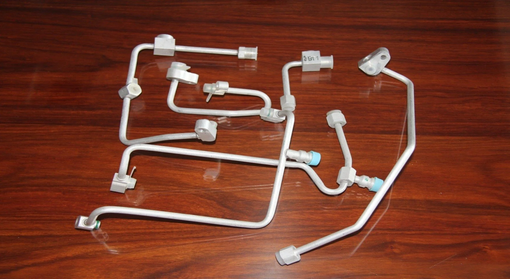 A/C Refrigerant Hose: 

Connector for aluminum pipes and hoses of the automotive air-conditioning aluminum piping system.

Customers: Japan, Taiwan, and Italy.