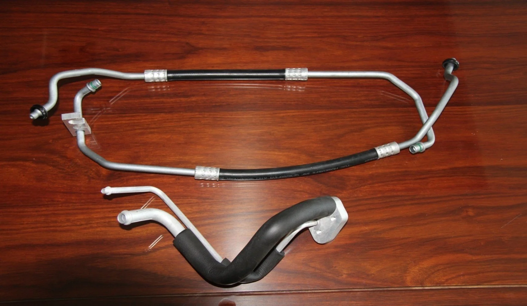 A/C Refrigerant Hose: 

Connector for aluminum pipes and hoses of the automotive air-conditioning aluminum piping system.

Customers:  Japan, Taiwan, and Italy.
