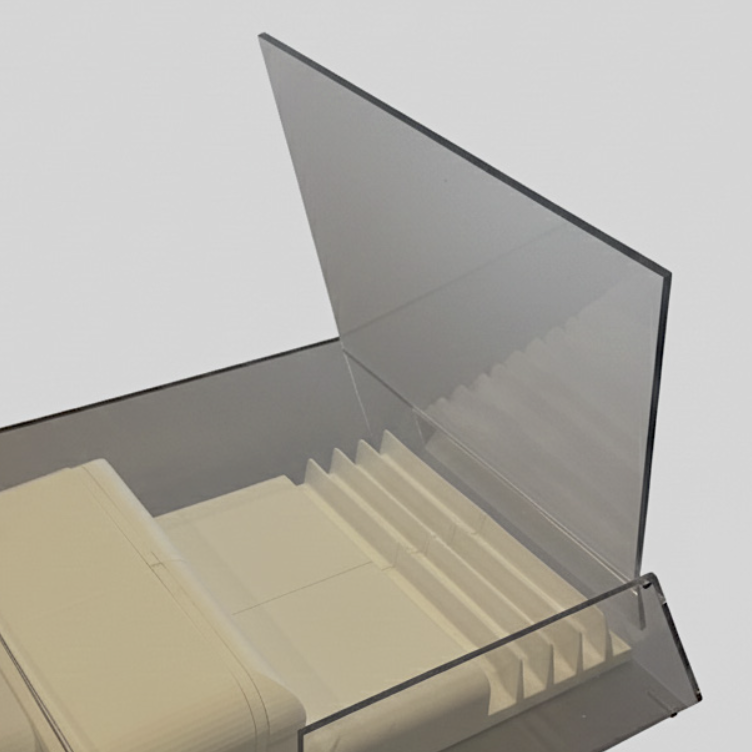 A transparent plastic storage box with a hinged lid, showing compartments inside for organizing small items.