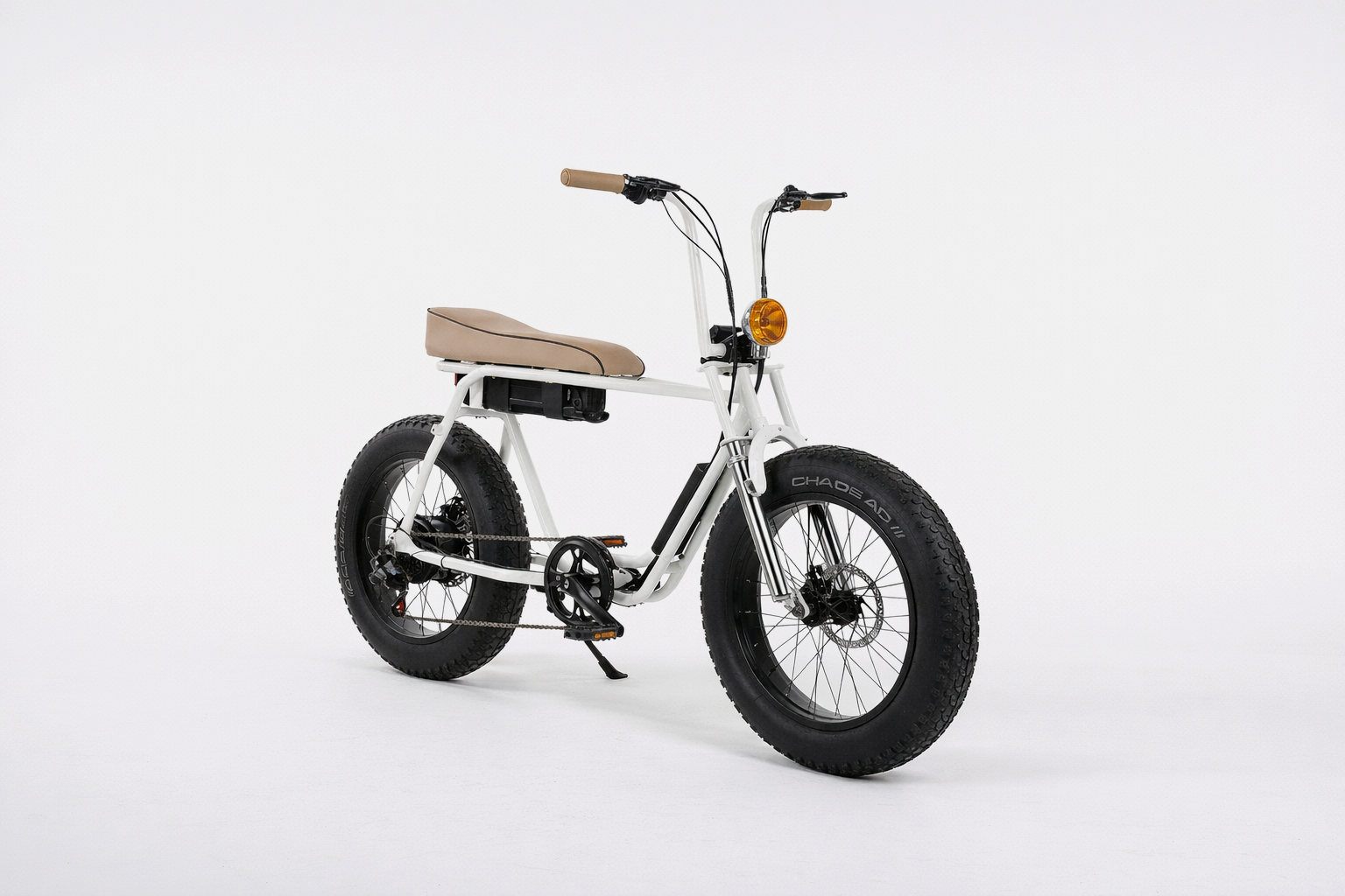 White electric fat-tire bicycle with tan seat and handlebars, black tires, orange front light, and black battery, set against a white background.