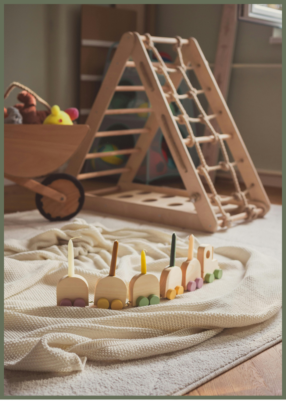 Children’s wooden toy train set in a play therapy space at Meadowbrook Counseling in Athens, Alabama
