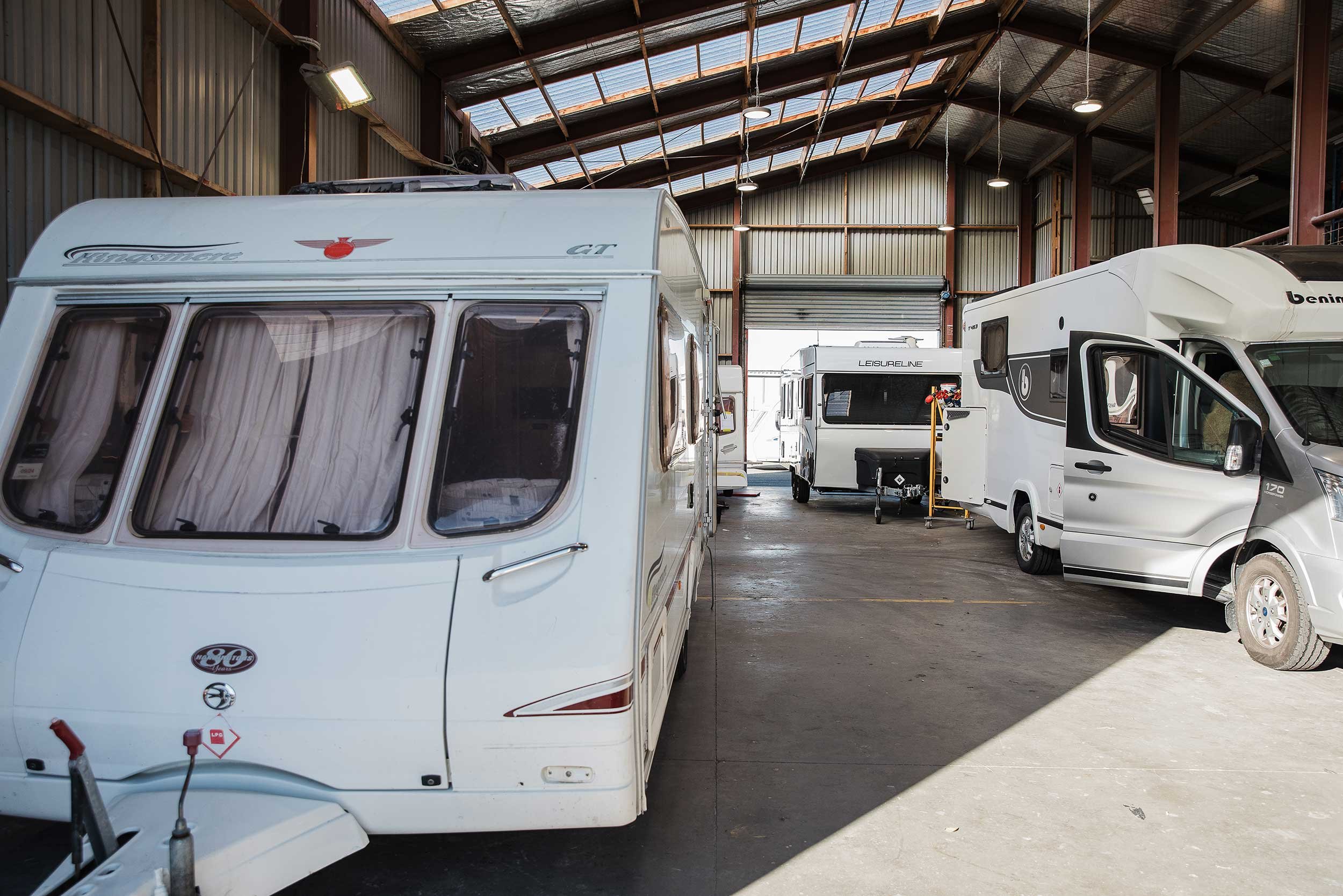 Caravan, motorhome and RV in workshop for collision repairs at A&M Panel Repairs in Napier