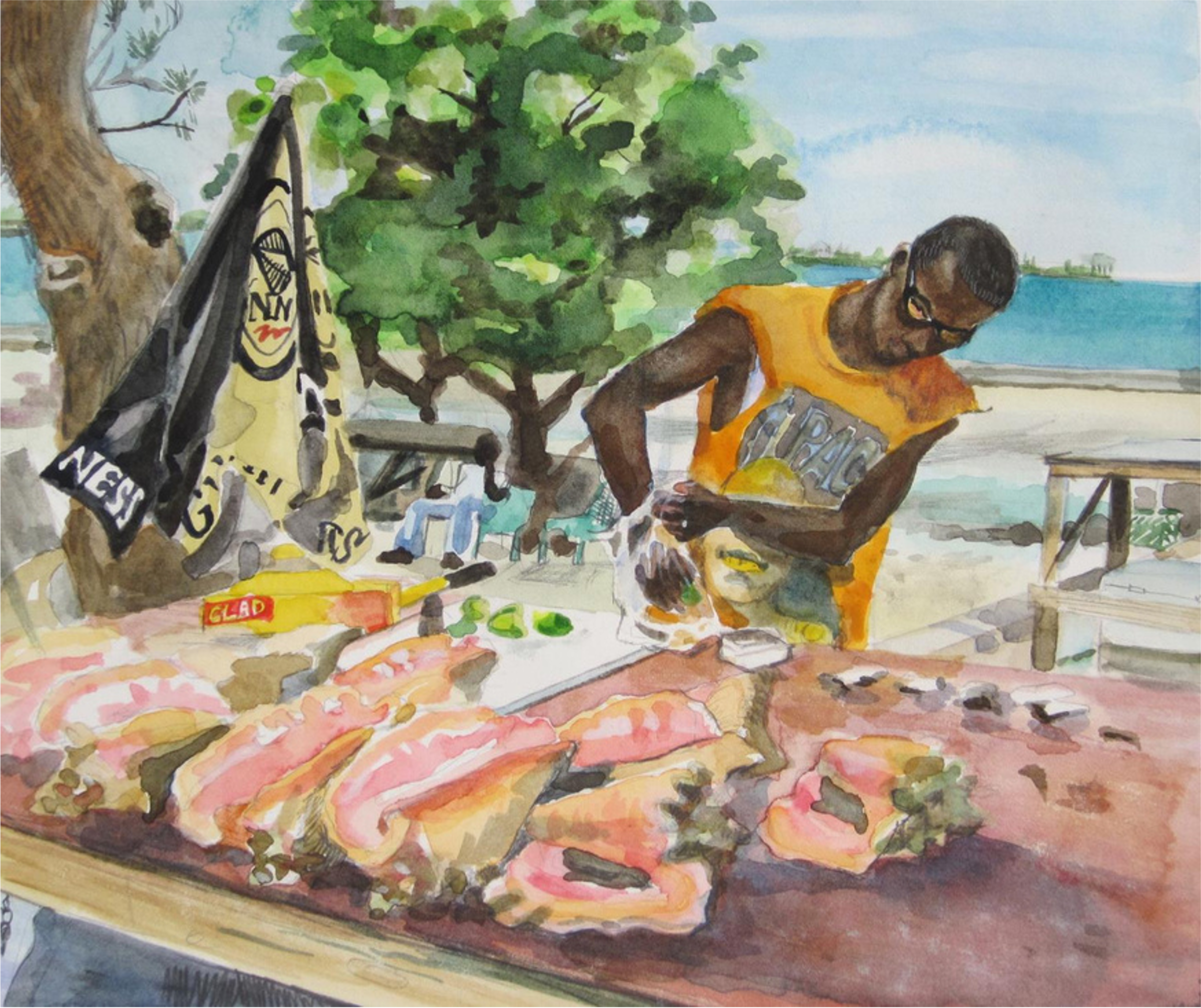 A man with dark skin, wearing sunglasses, a yellow sleeveless shirt with the word 'PRIDE' on it, and shorts, is preparing food outdoors near a body of water. There are slices of meat laid on a table in front of him, with various cooking ingredients a