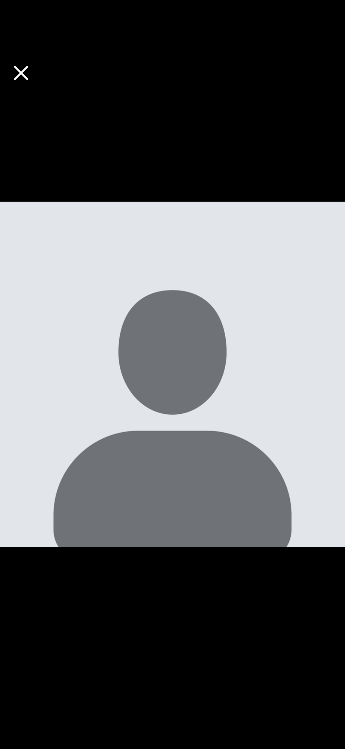 A grayscale digital avatar with a circular head and shoulders, set against a light background.