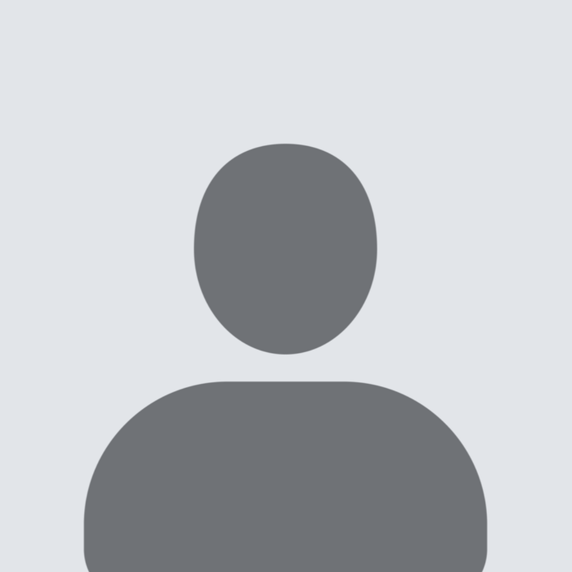 A grayscale digital avatar with a circular head and shoulders, set against a light background.